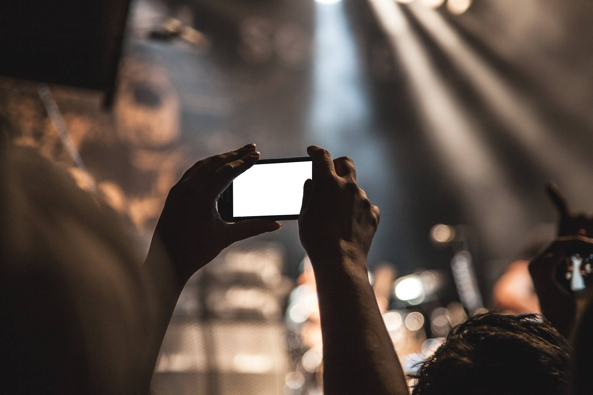 glowing phone, live concert, dramatic stage lights, Full HD Desktop Wallpaper