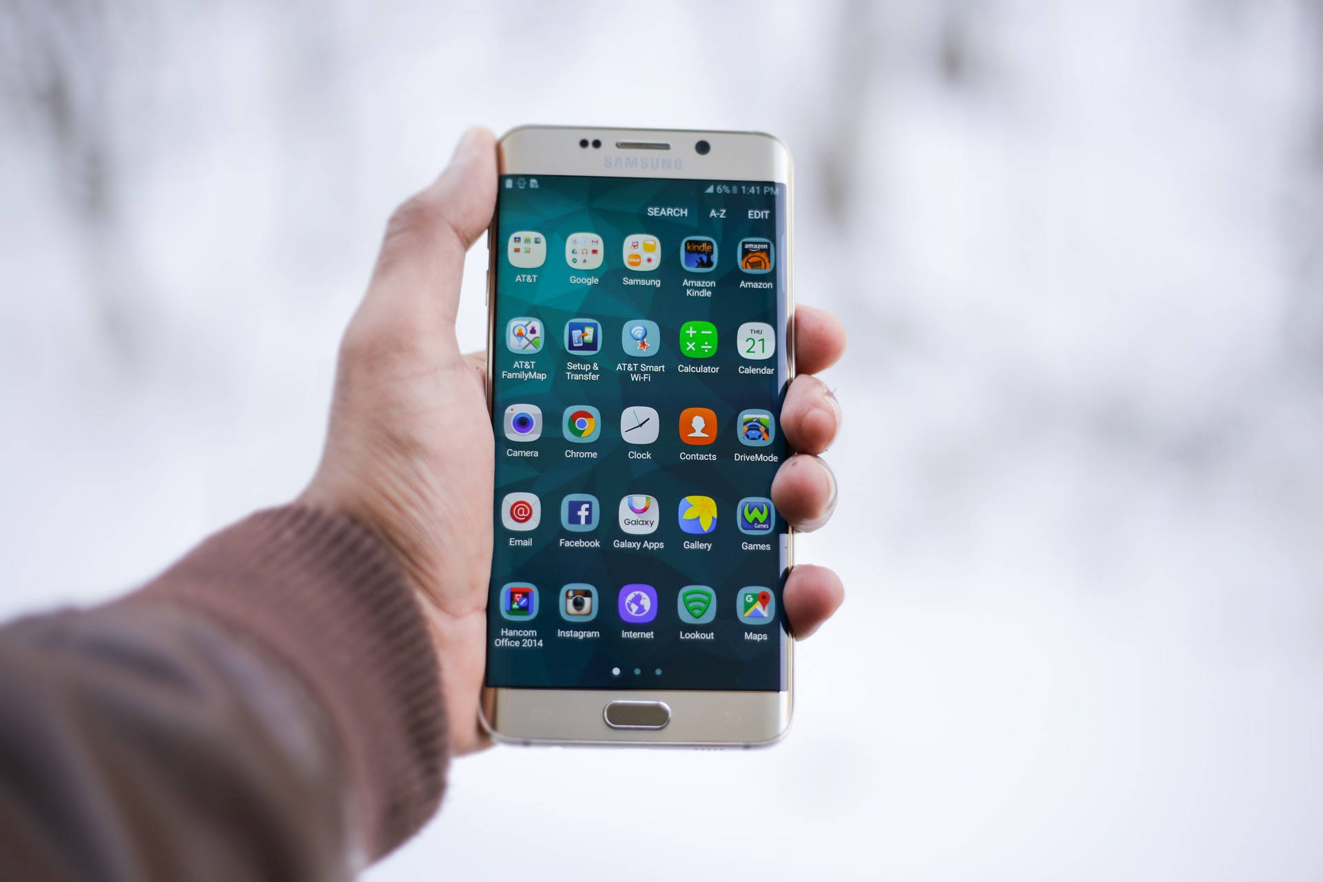 smartphone, grid of app icons, snowy outdoor background, Full HD Desktop Wallpaper