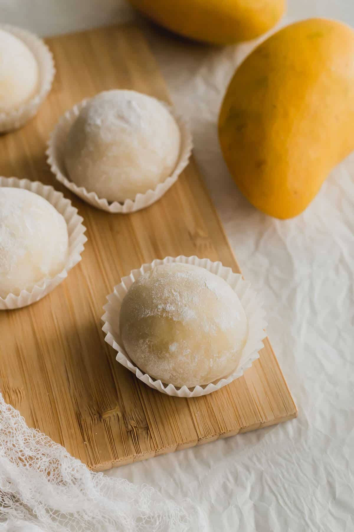 mango mochi, powdered sugar, paper cups, HD Phone Wallpaper