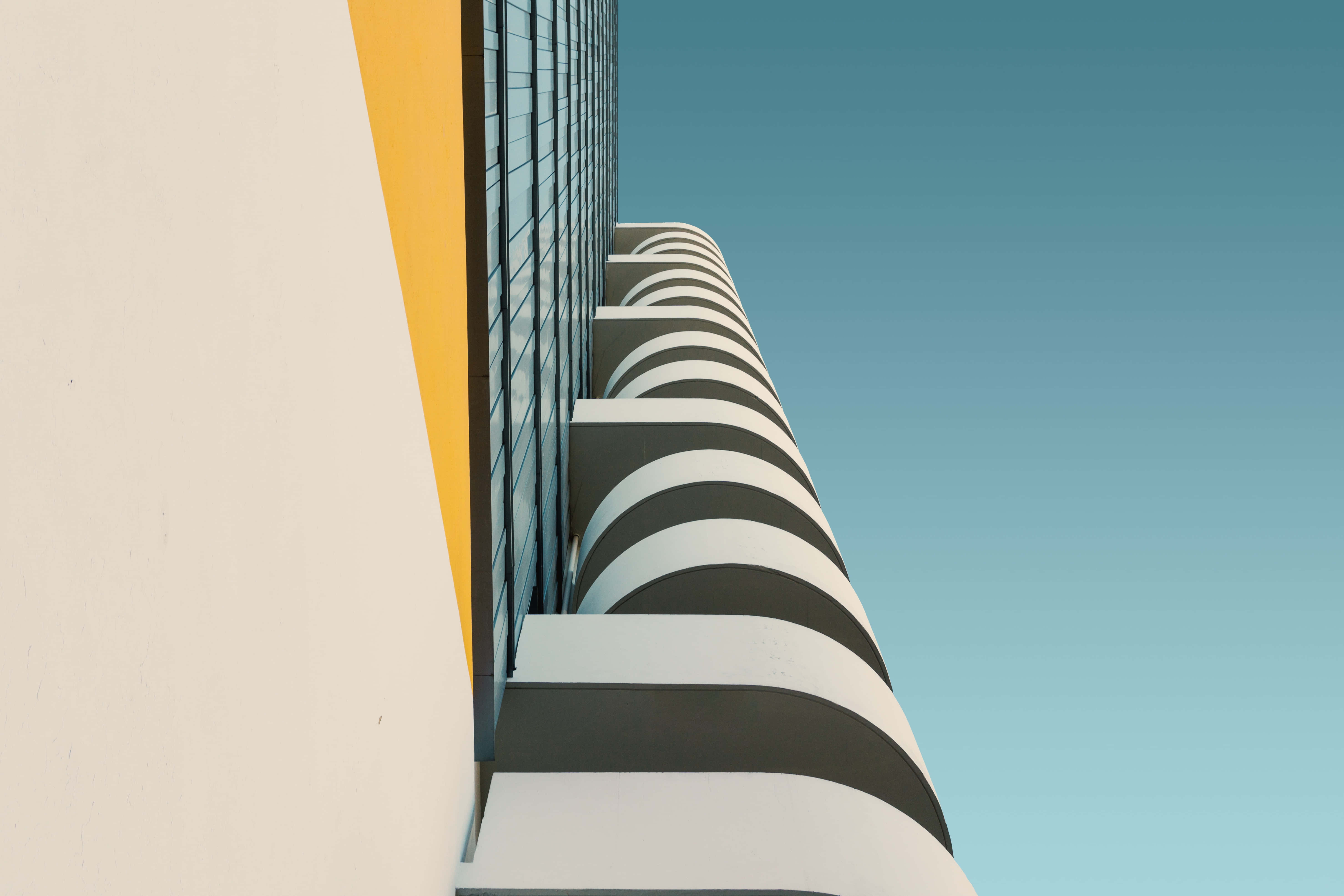 Modernism, black and white curved balconies, clear blue sky, 5K Desktop Wallpaper