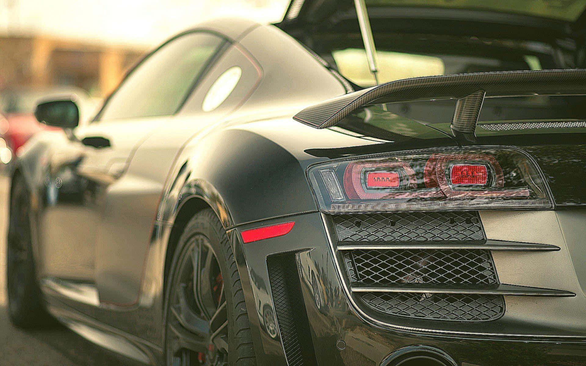 matte black, carbon fiber spoiler, glowing red taillights, Full HD Desktop Wallpaper