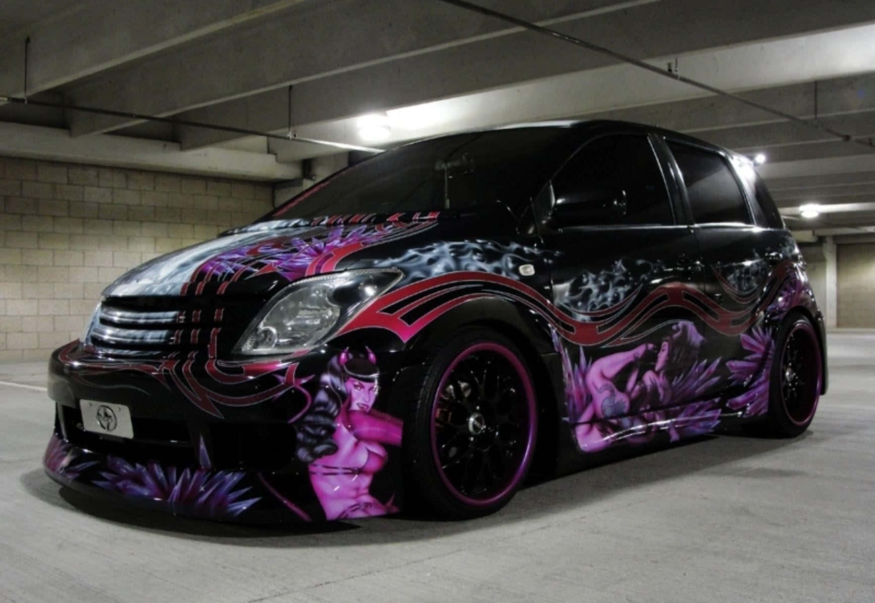 black custom car, vibrant purple and pink devil-themed graffiti art, concrete underground garage, HD Desktop Wallpaper