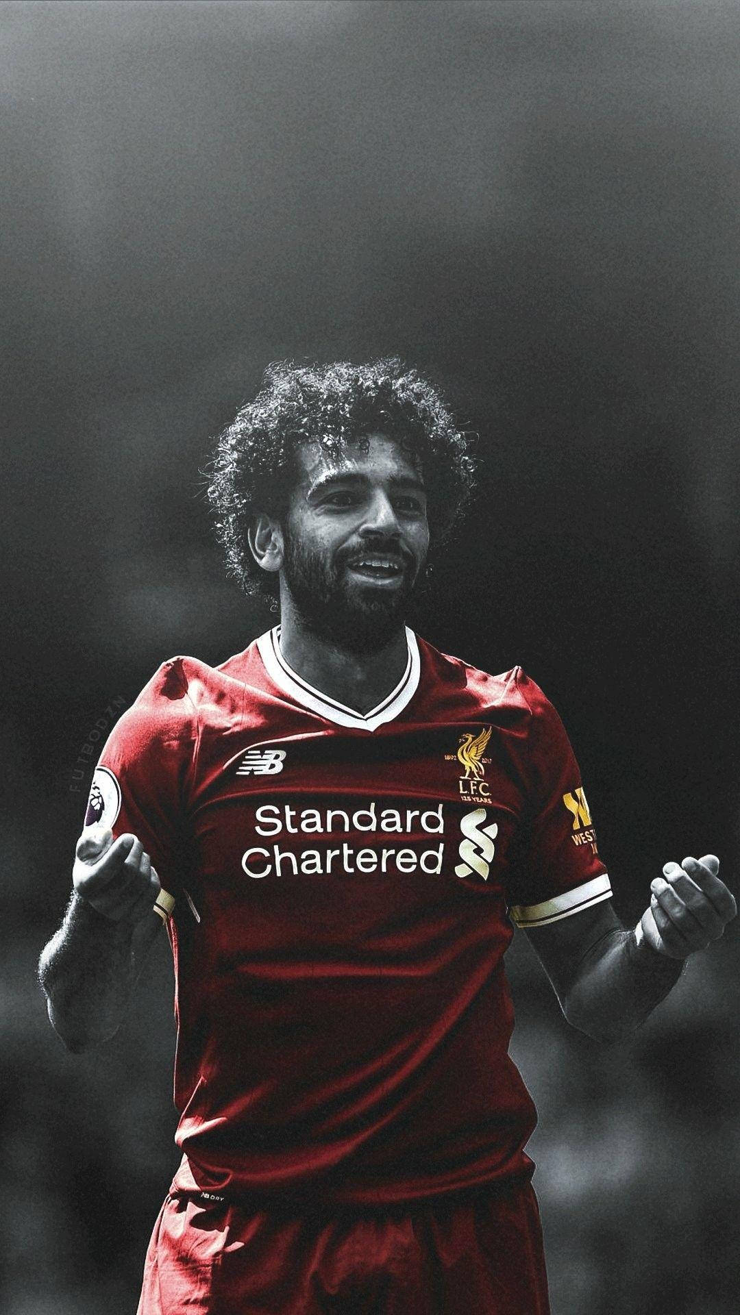 Mohamed Salah, red Liverpool jersey, dark blurred stadium background, Full HD Phone Wallpaper