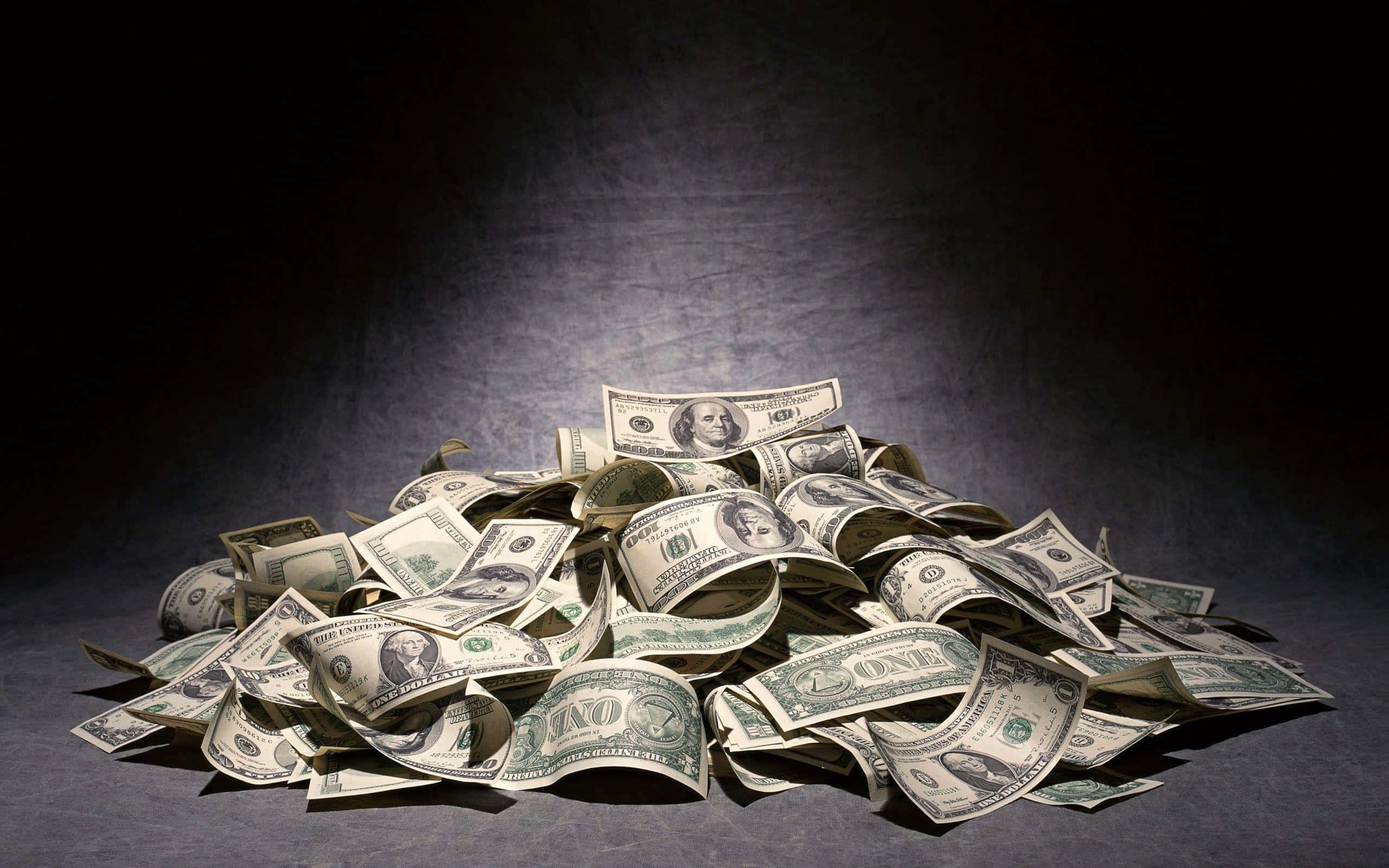 100 dollar bills, dramatic spotlight, dark textured backdrop, 2K Desktop Wallpaper