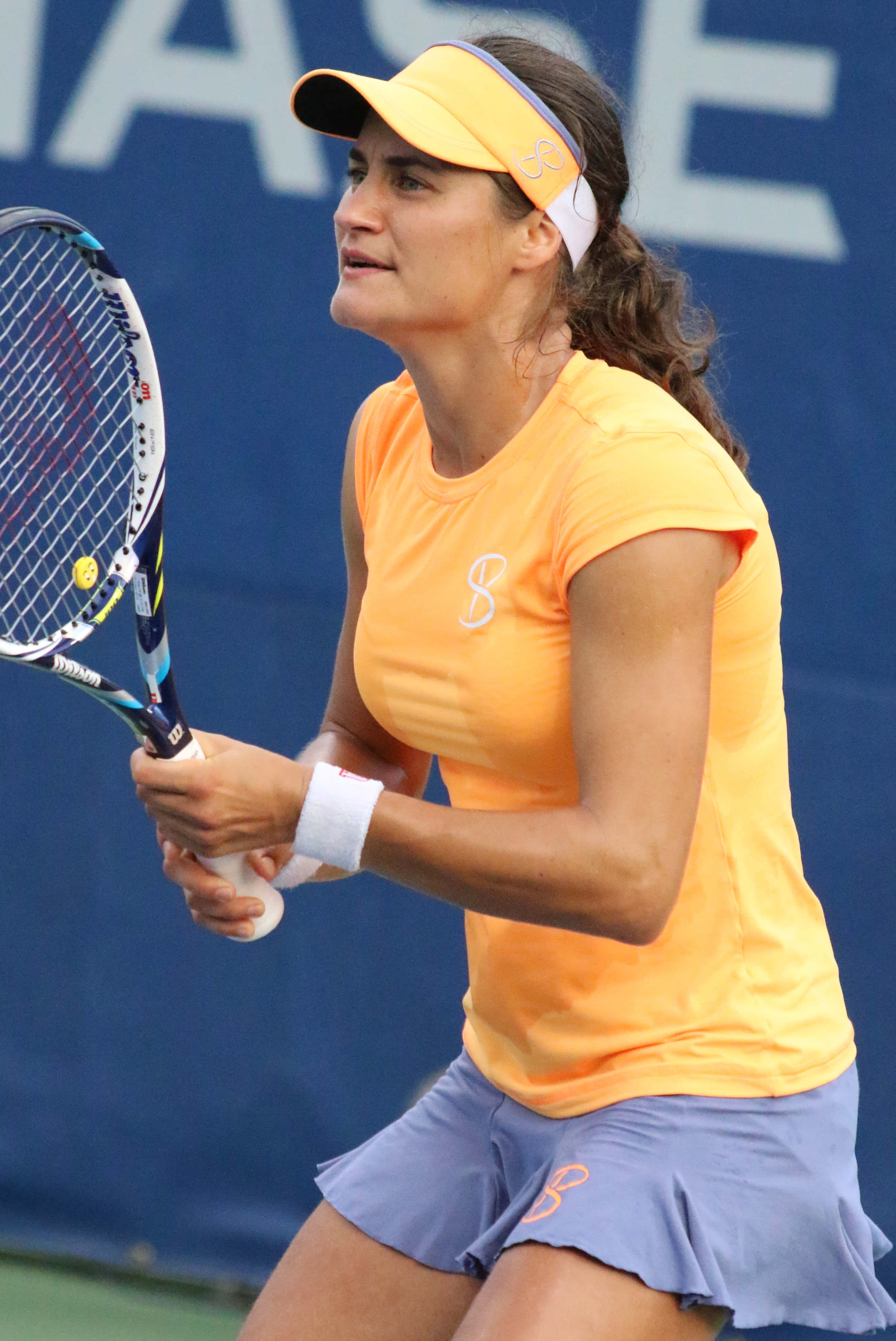 Monica Niculescu, orange tennis outfit, blue skirt, 4K Phone Wallpaper