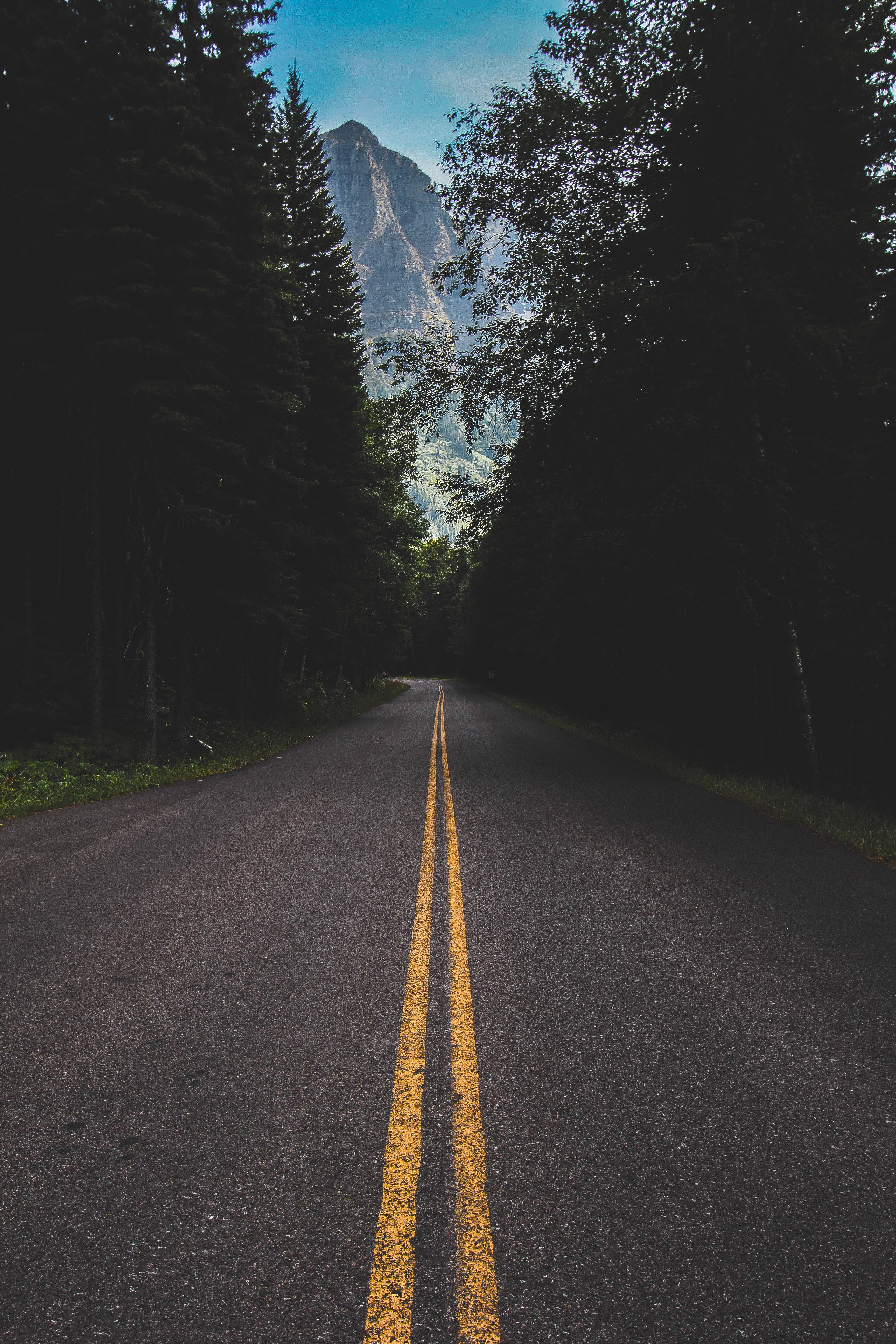 highway road in montana, asphalt road, yellow lines, 5K Phone Wallpaper