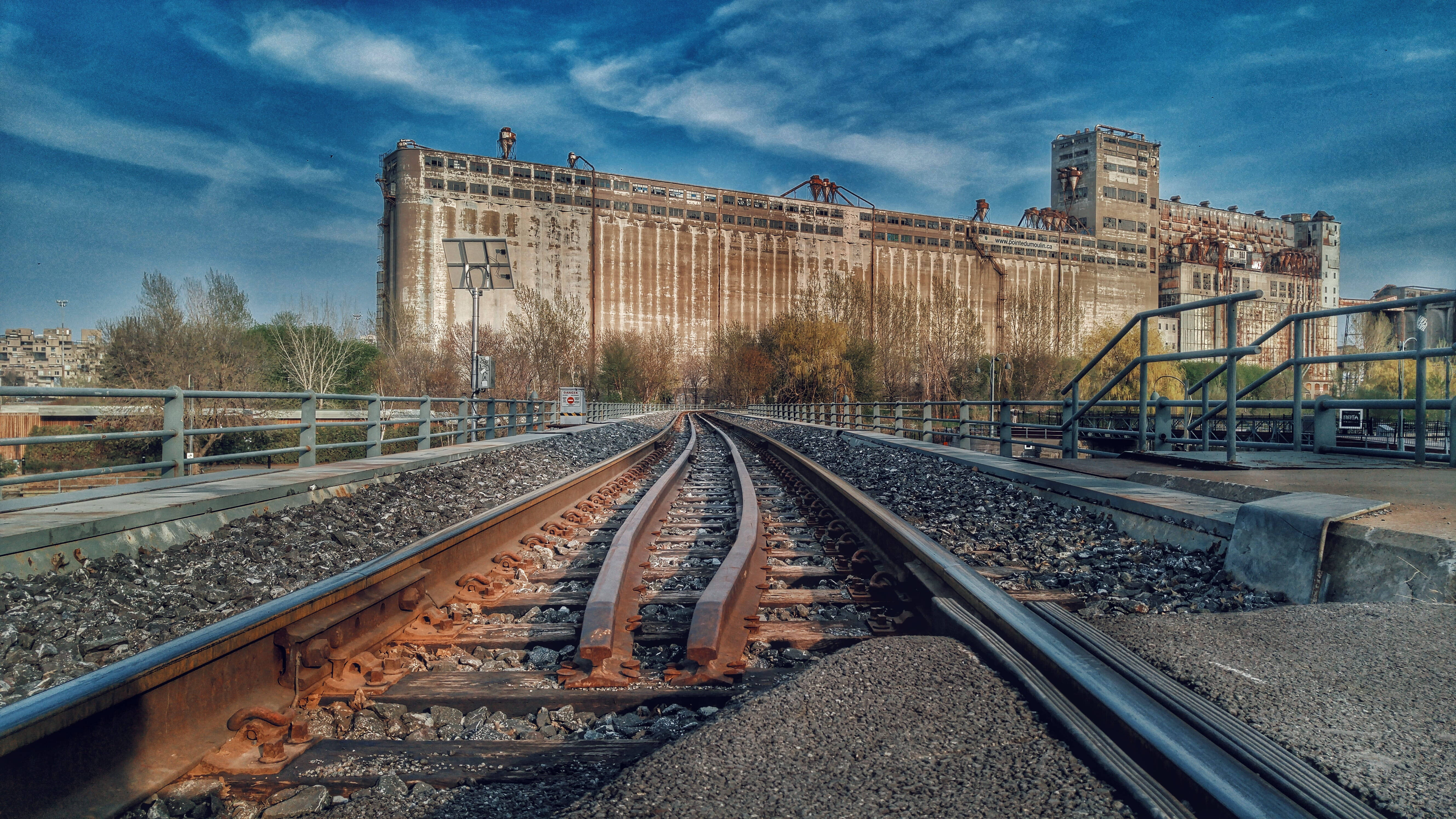 Montreal, rail tracks, weathered industrial building, 5K Desktop Wallpaper