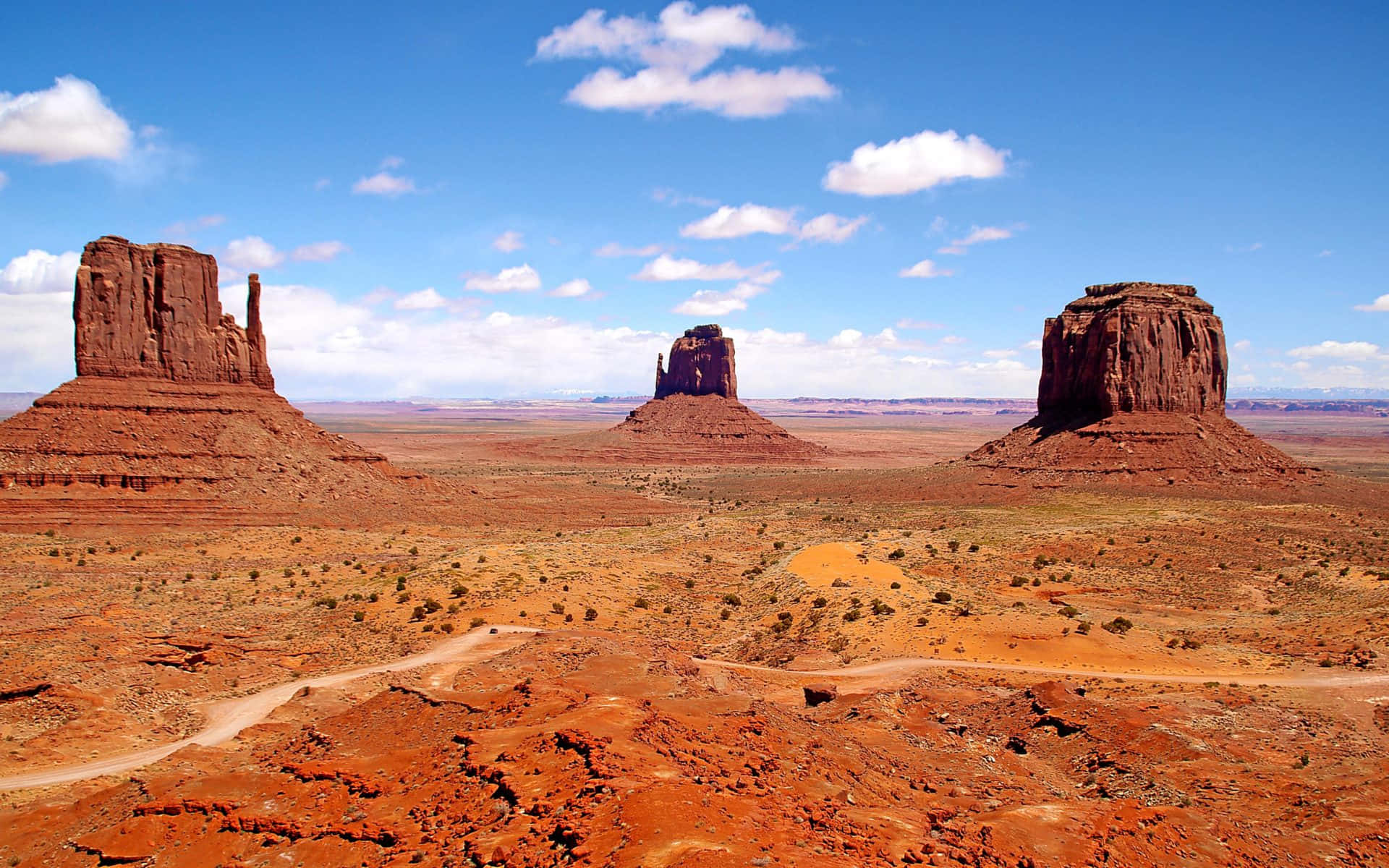 Monument Valley Navajo Tribal Park, red rock buttes, bright blue sky, Full HD Desktop Wallpaper