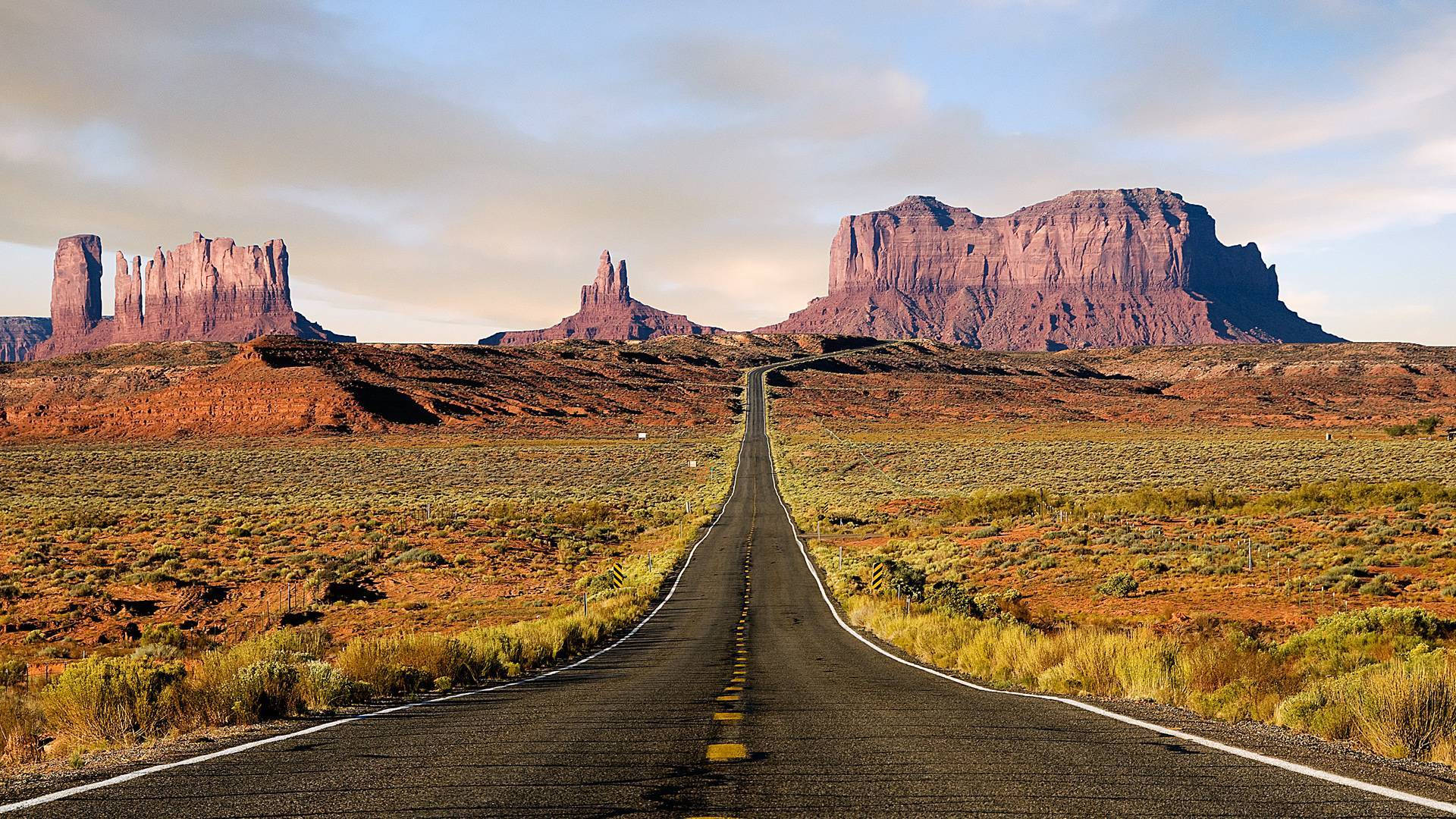 Monument Valley, red rock formations, golden sky, Full HD Desktop Wallpaper