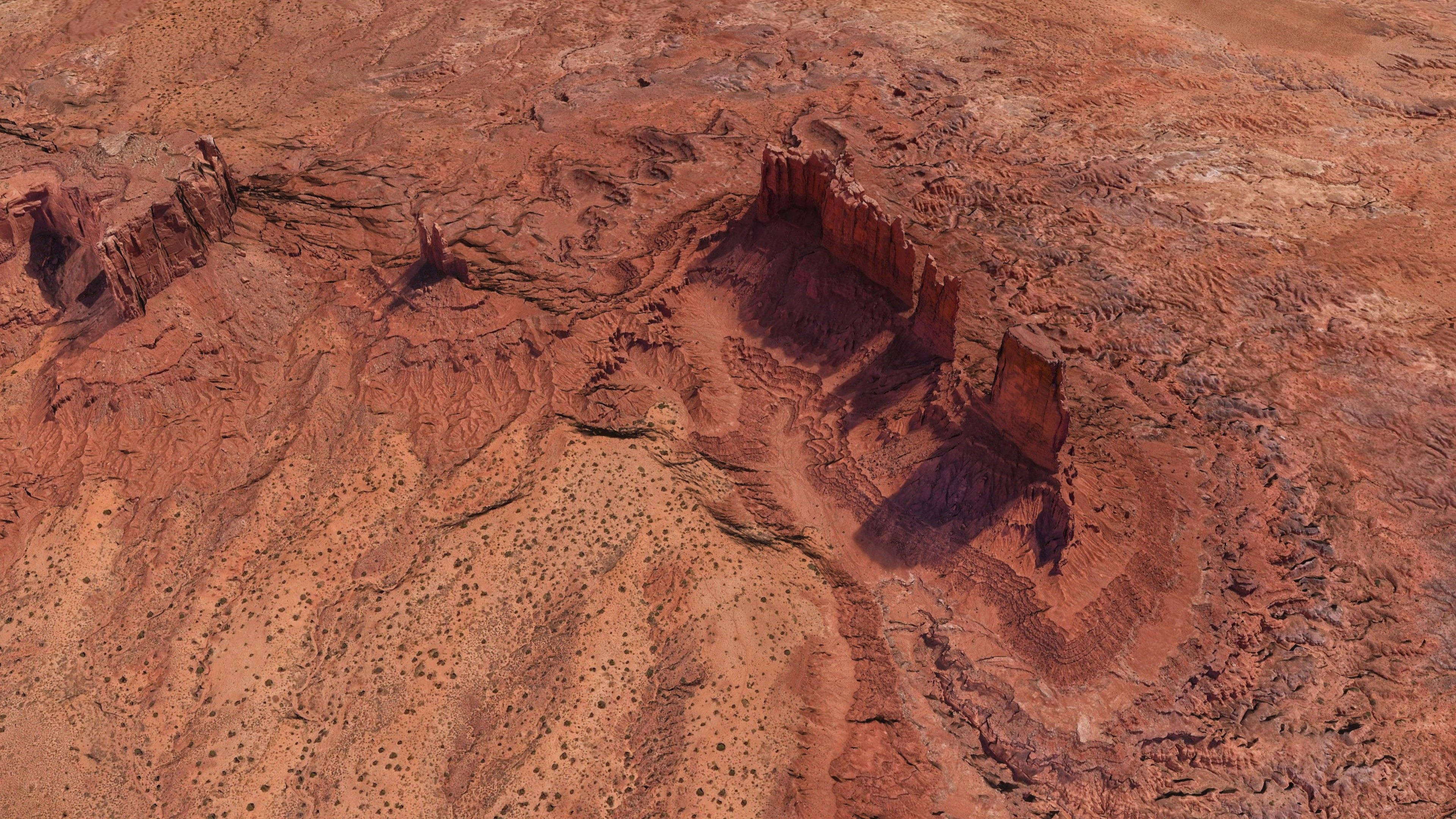 Monument Valley, rugged red rock formations, winding canyons, 4K Desktop Wallpaper