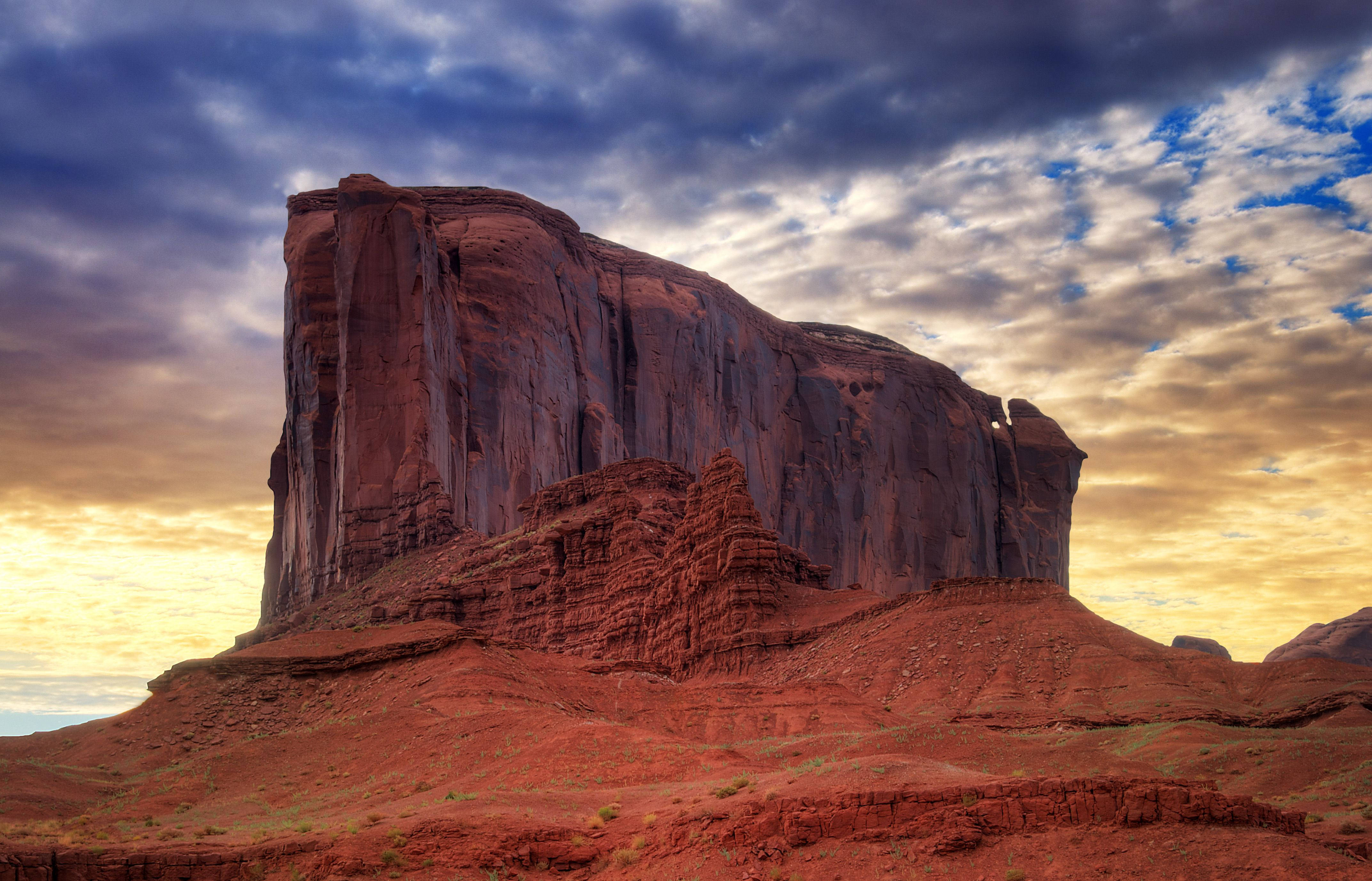 Monument Valley, red sandstone butte, golden sunset hues, 4K Desktop Wallpaper