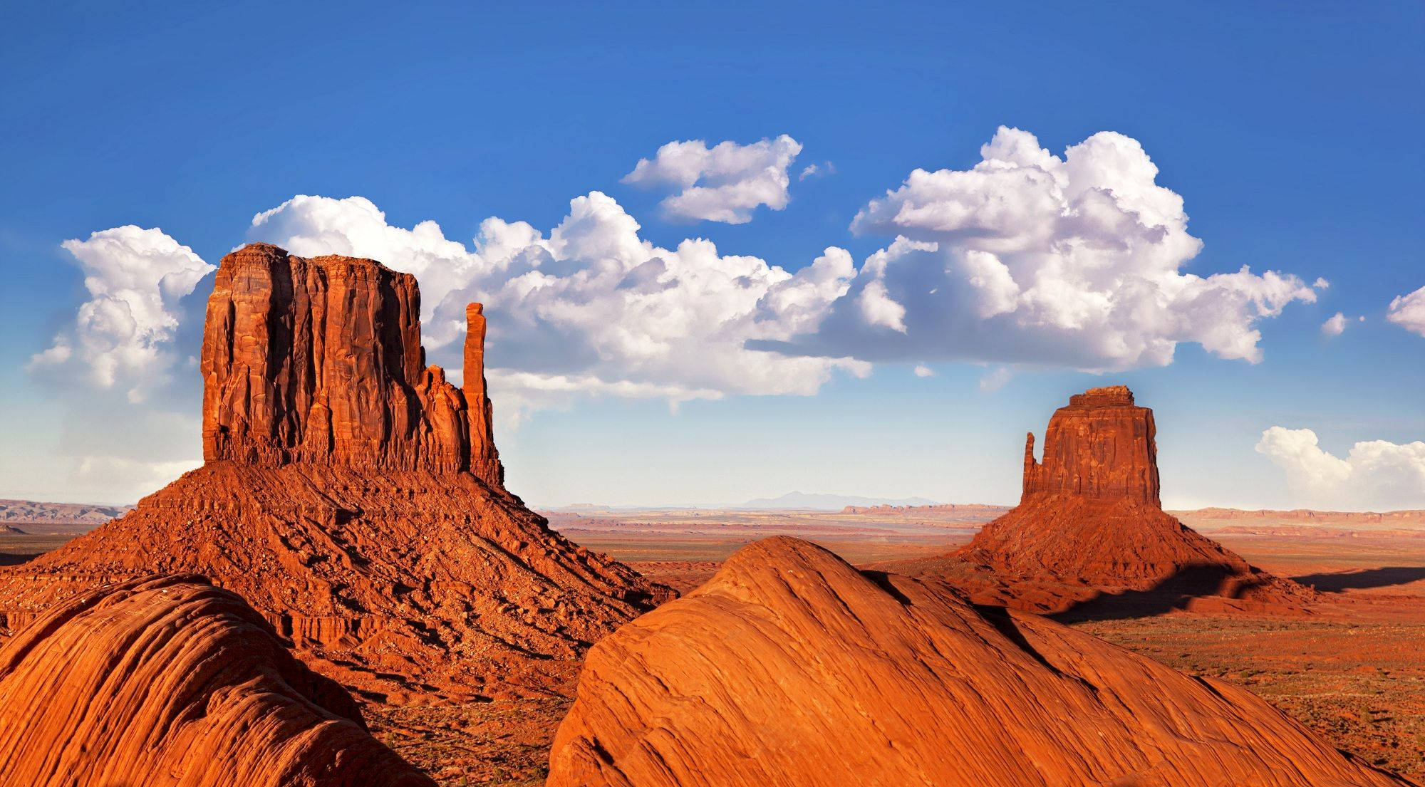Monument Valley, red rock formations, bright blue sky, Full HD Desktop Wallpaper