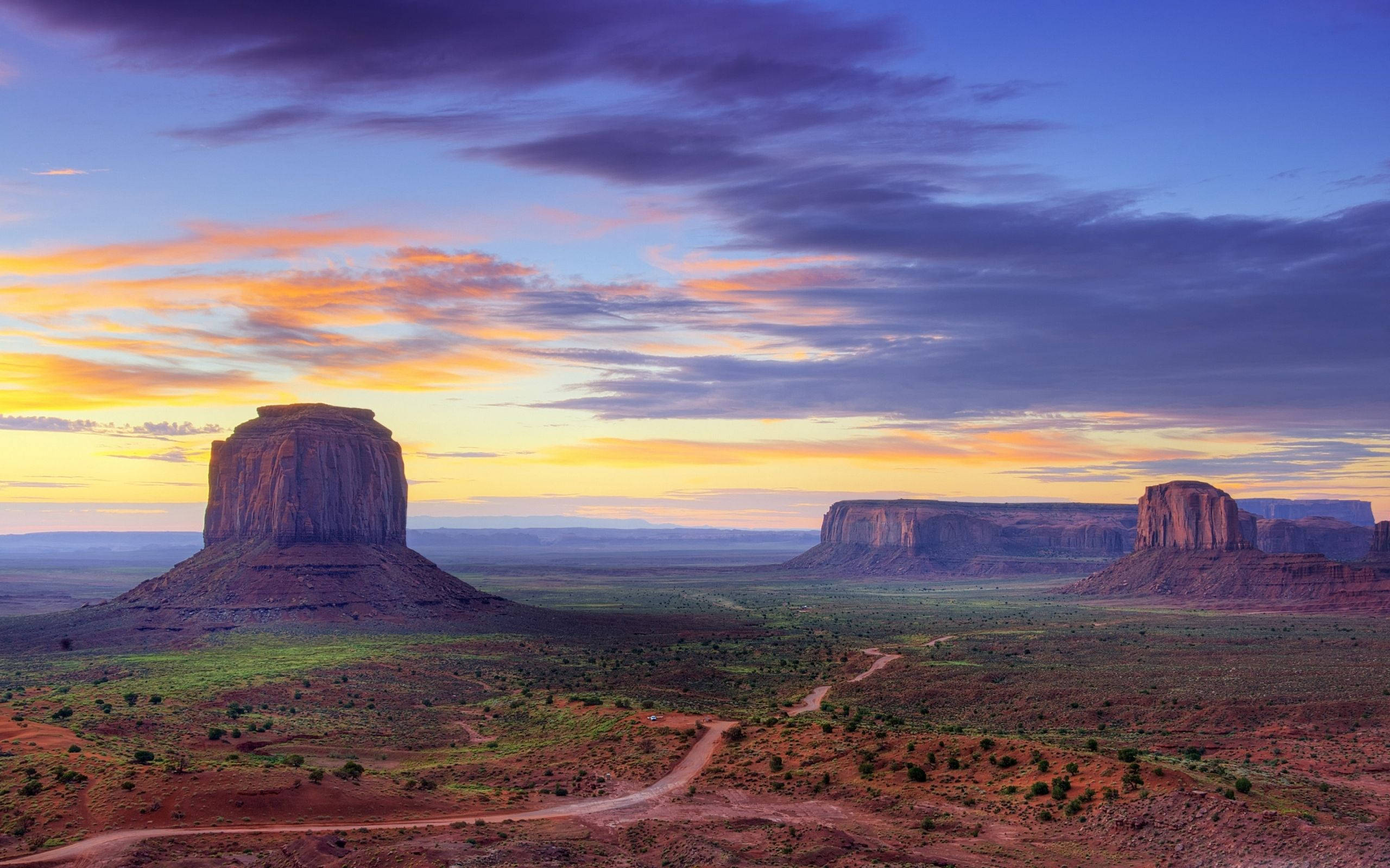 Monument Valley, red rock buttes, desert sunset, 2K Desktop Wallpaper