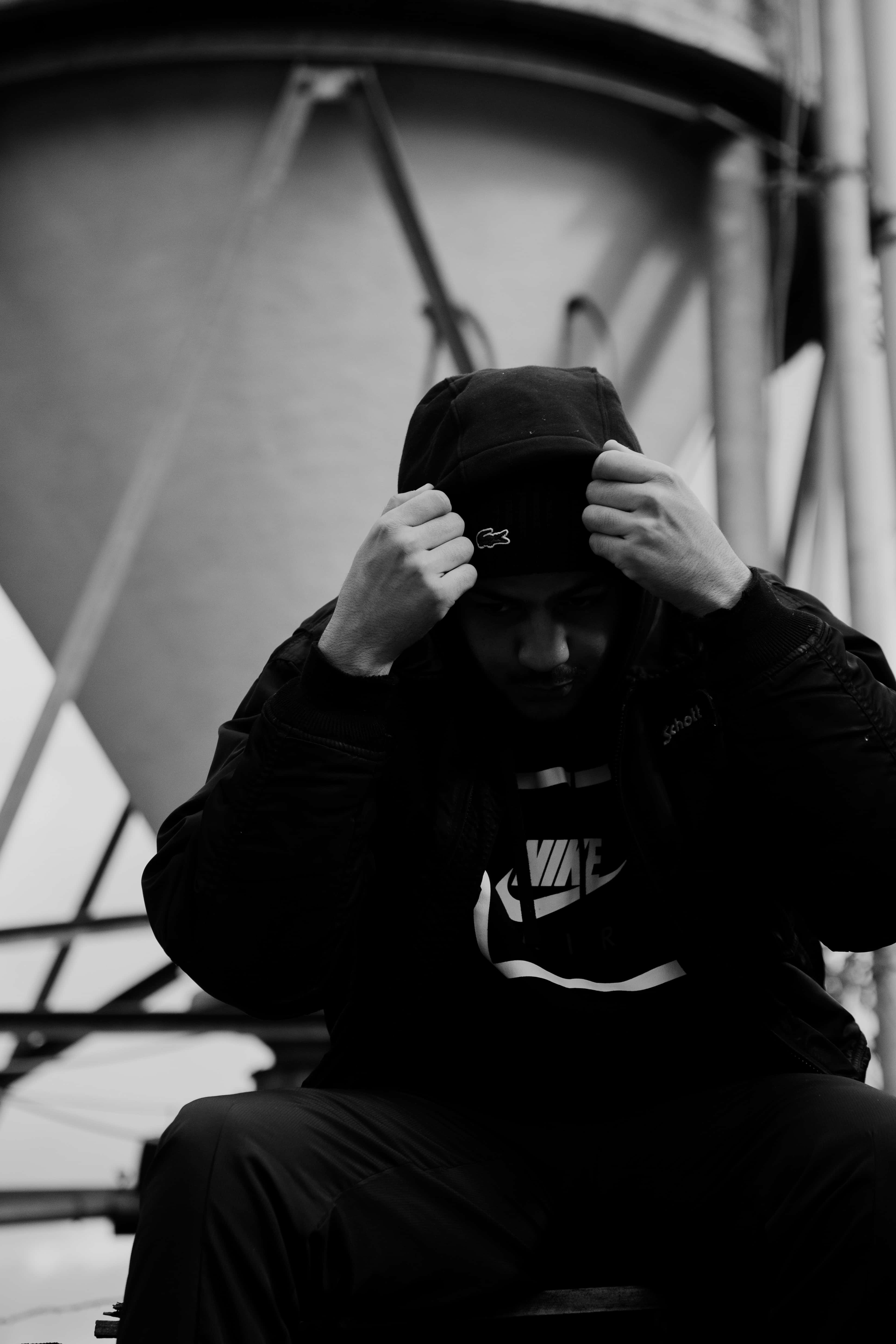 black hoodie, stark industrial setting, person, 5K Phone Wallpaper