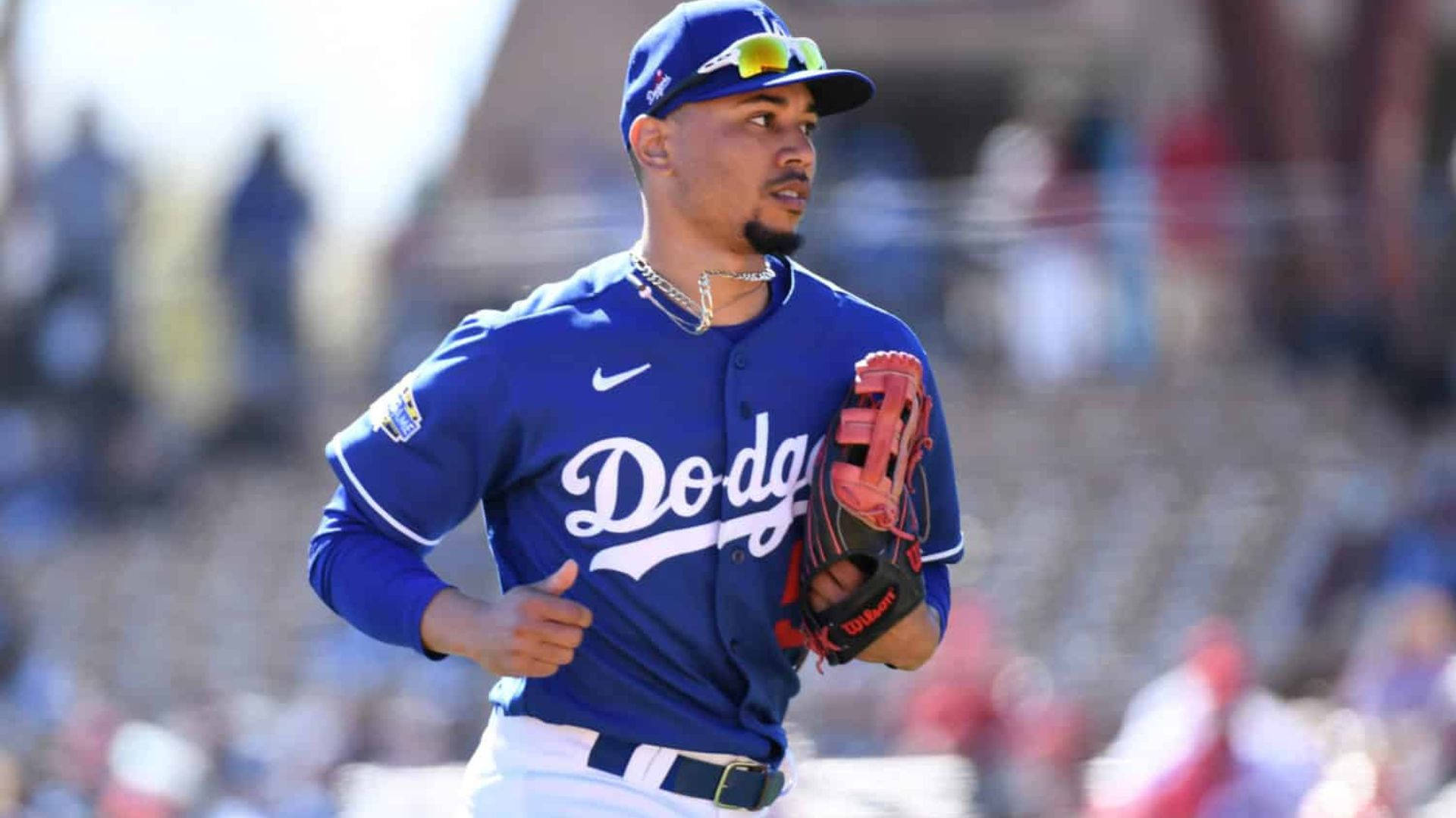 Mookie Betts, blue Dodgers uniform, sunlit stadium field, Full HD Desktop Wallpaper