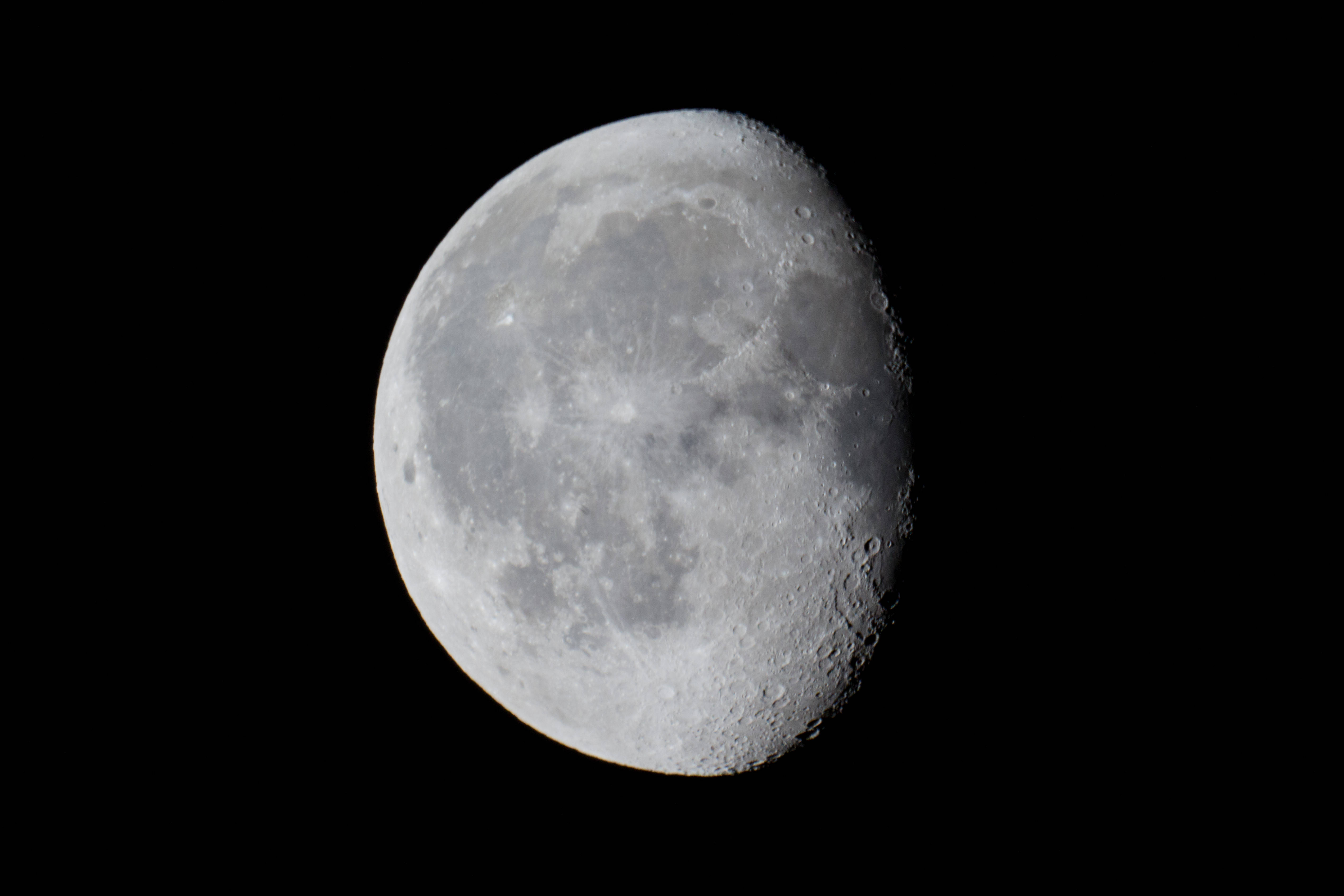 waxing gibbous moon, cratered gray surface, pitch-black sky, 4K Desktop Wallpaper