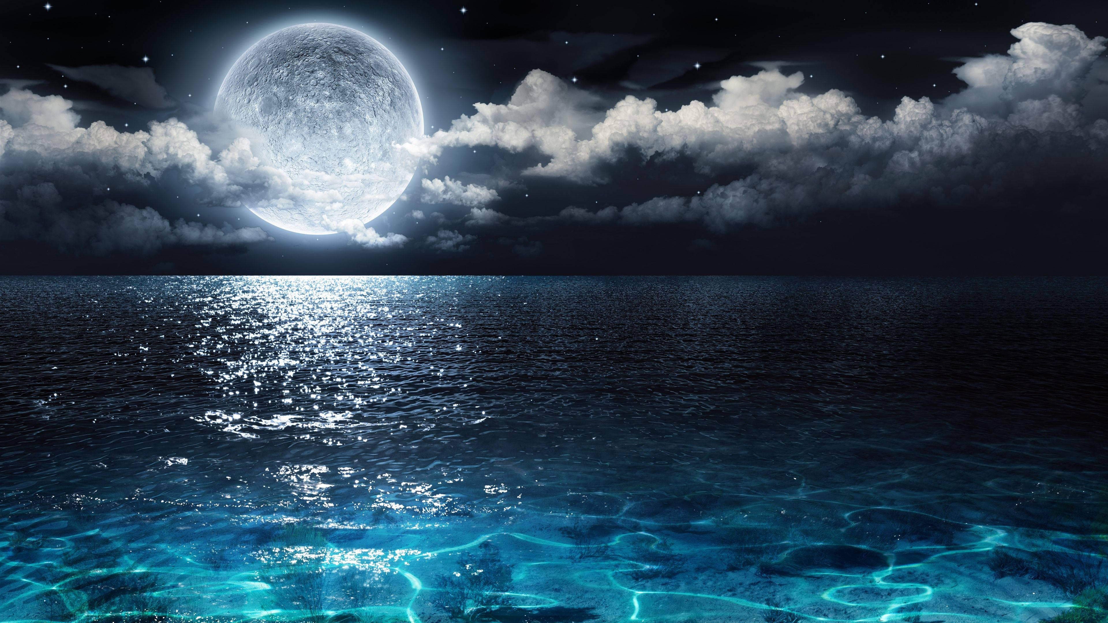 full moon, dramatic clouds, shimmering silver light, 4K Desktop Wallpaper