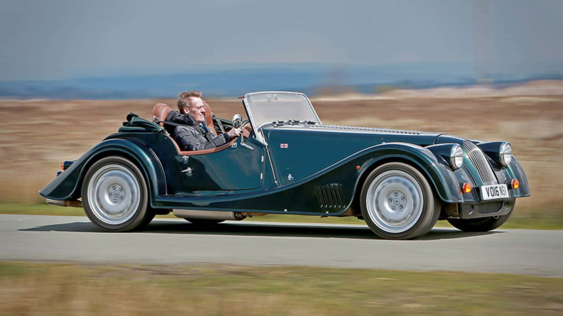 Morgan Plus 8, classic green convertible sports car, rural road, Full HD Desktop Wallpaper
