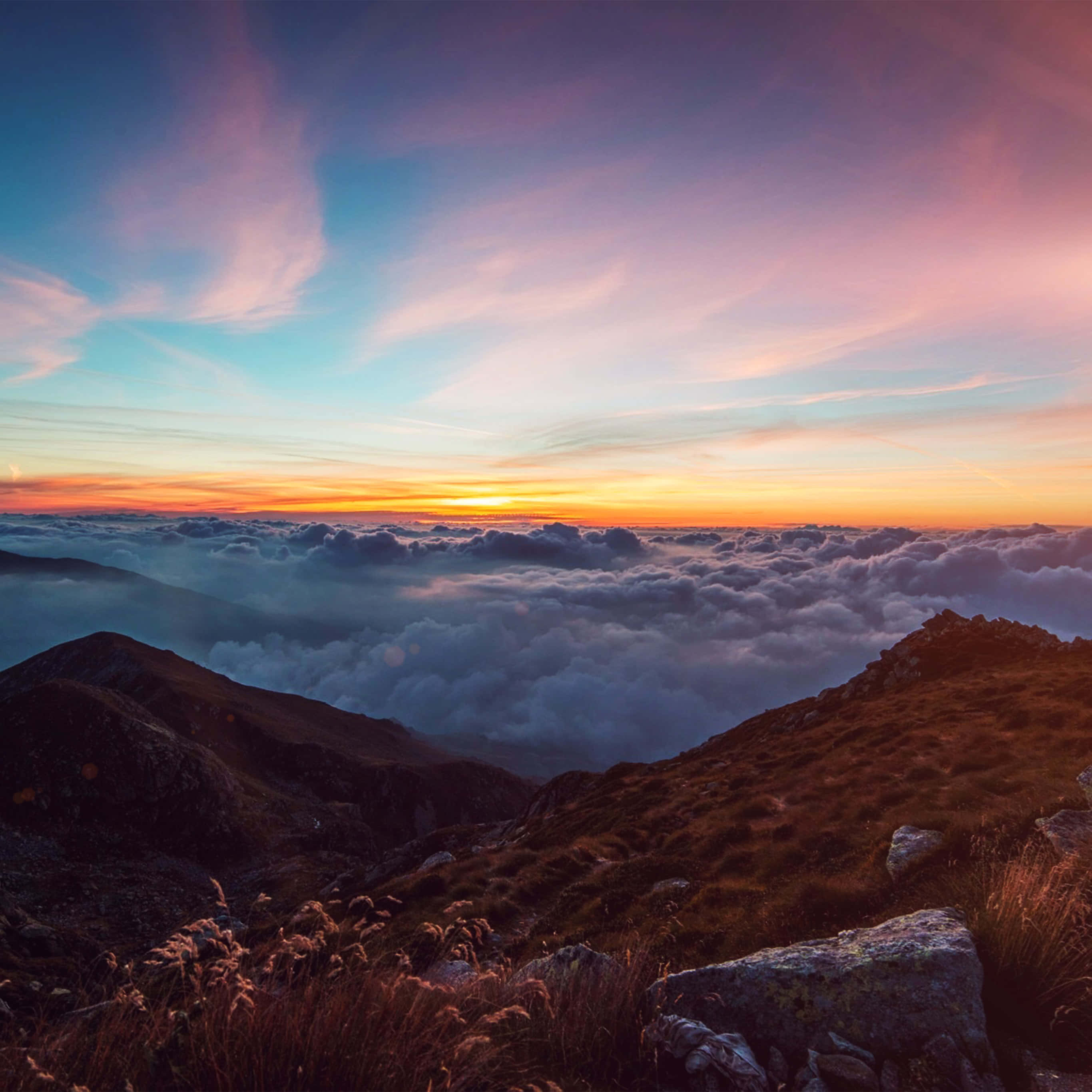 Sunset, vibrant sky, sea of clouds, 2K Desktop Wallpaper