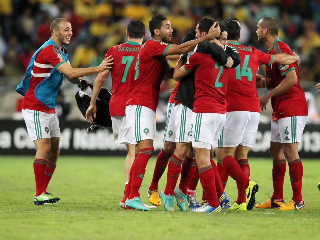 Morocco National Football Team, red jerseys, vibrant green pitch, SD Desktop Wallpaper