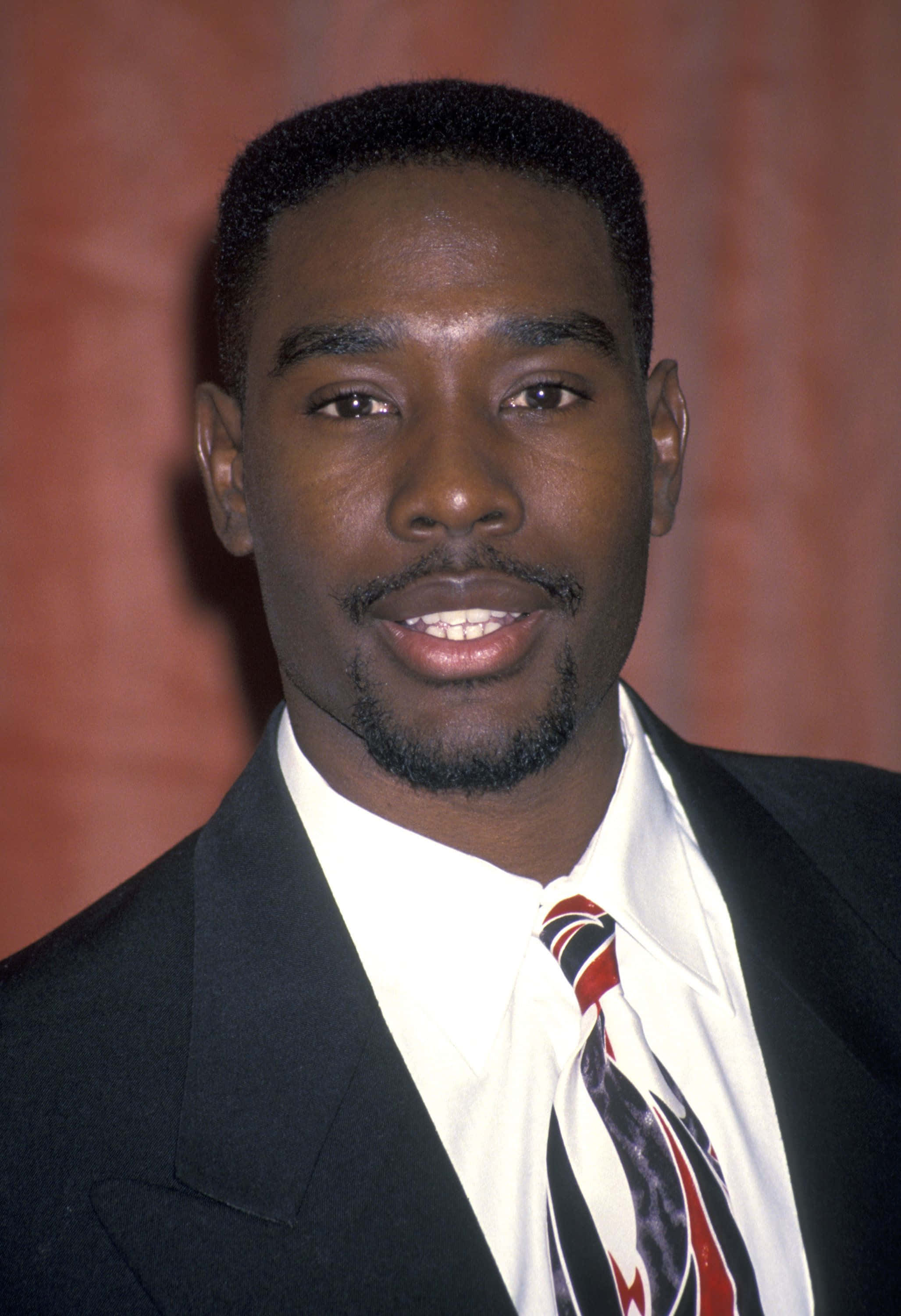 Morris Chestnut, black suit, patterned tie, 2K Phone Wallpaper