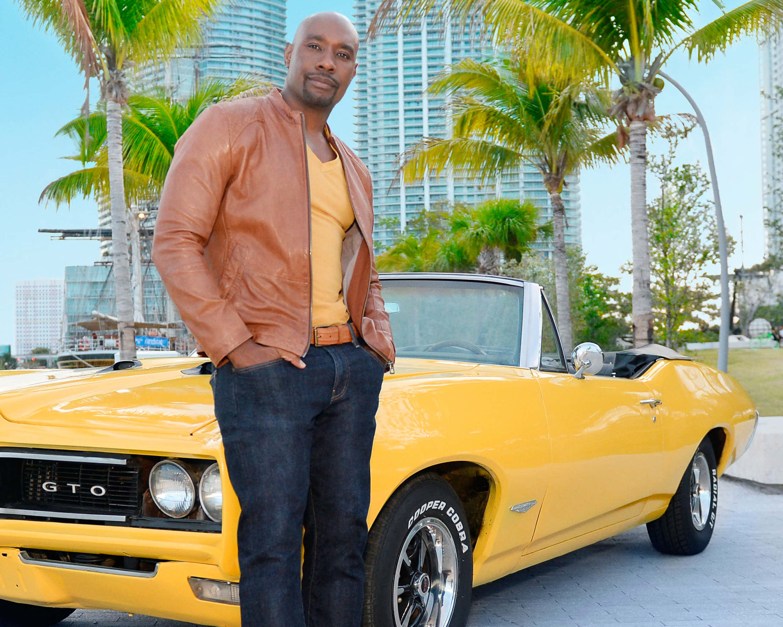 Morris Chestnut, yellow classic GTO convertible, brown leather jacket, 2K Desktop Wallpaper