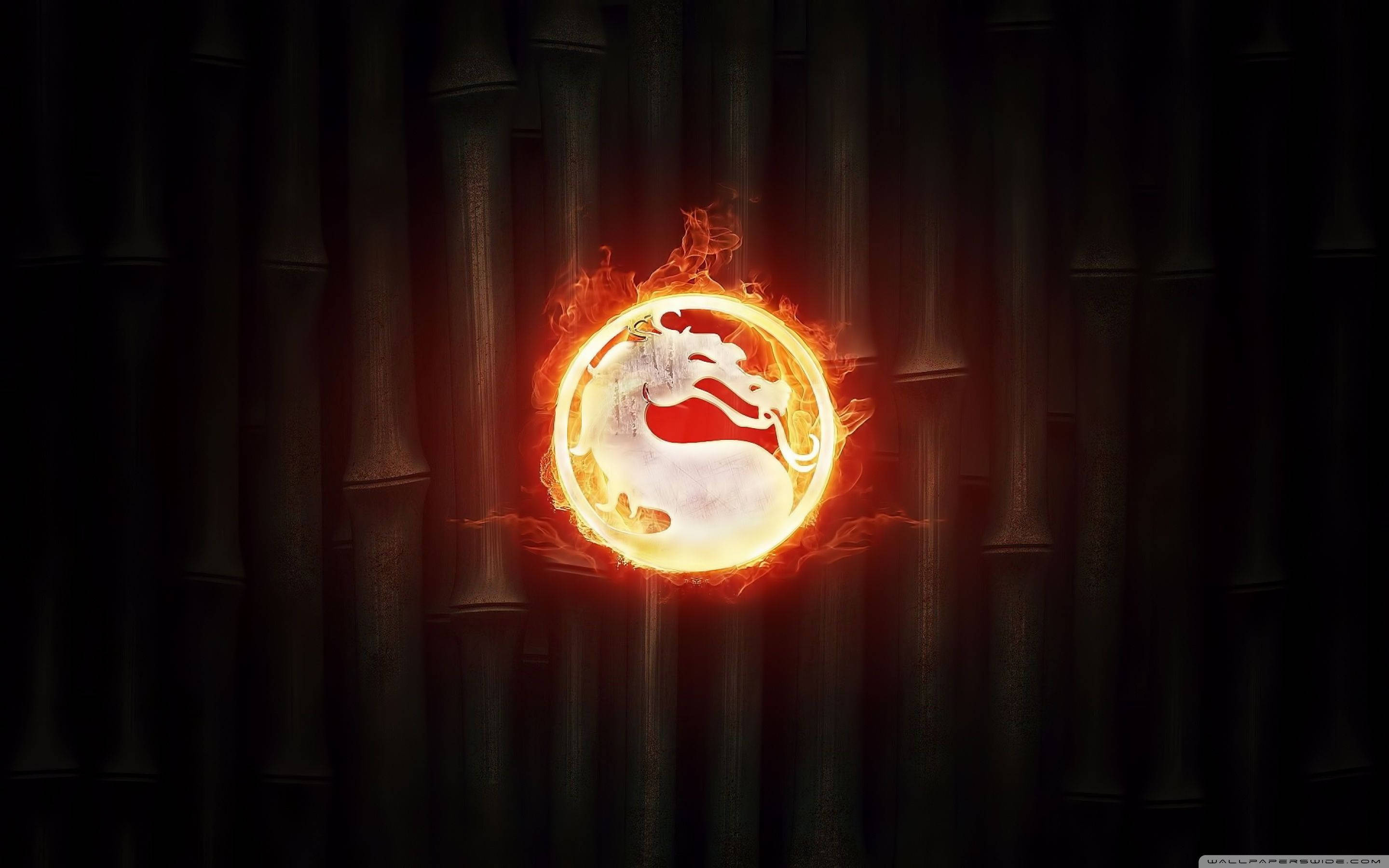 Mortal Kombat, fiery dragon logo, dark bamboo backdrop, 2K Desktop Wallpaper