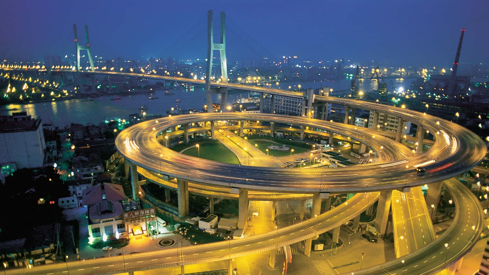 glowing spiral highway interchange, night, streaking car lights, Full HD Desktop Wallpaper