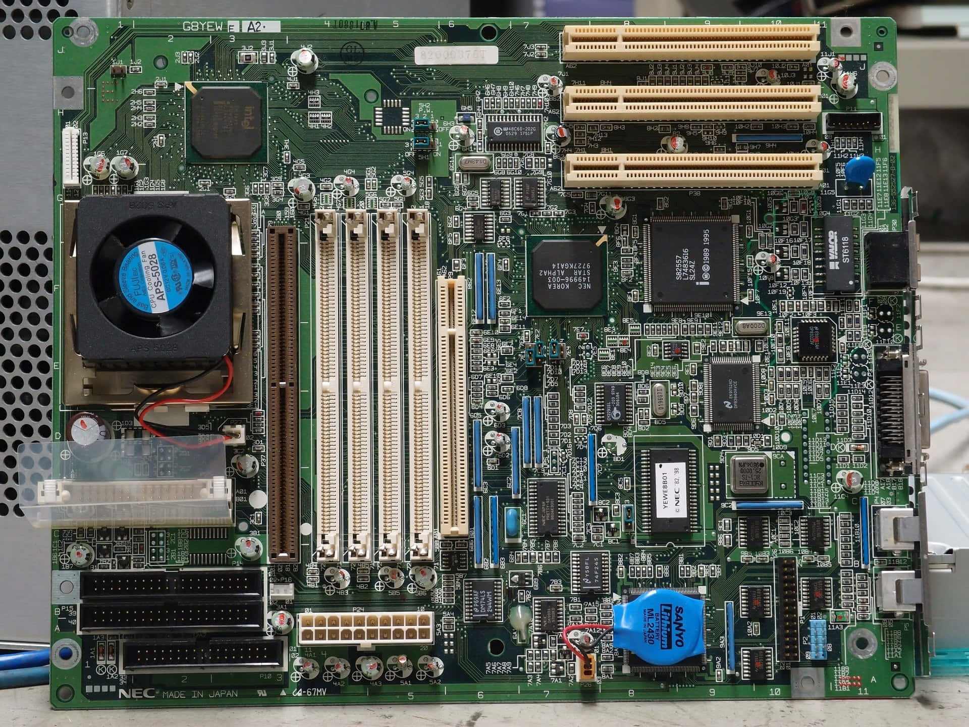 green computer motherboard, gold slots, blue capacitors, Full HD Desktop Wallpaper