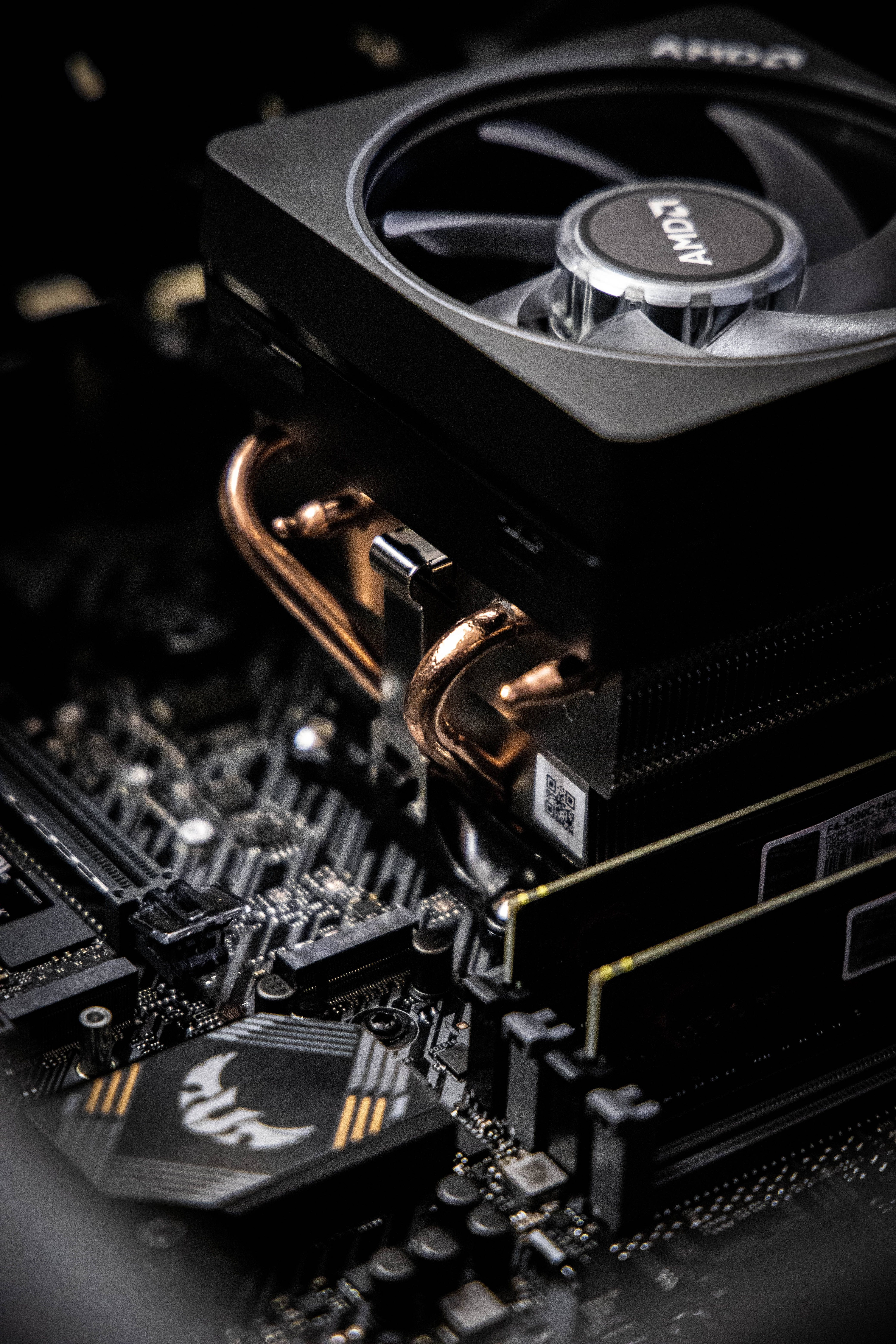 AMD CPU cooler, copper pipes, black motherboard, 5K Phone Wallpaper