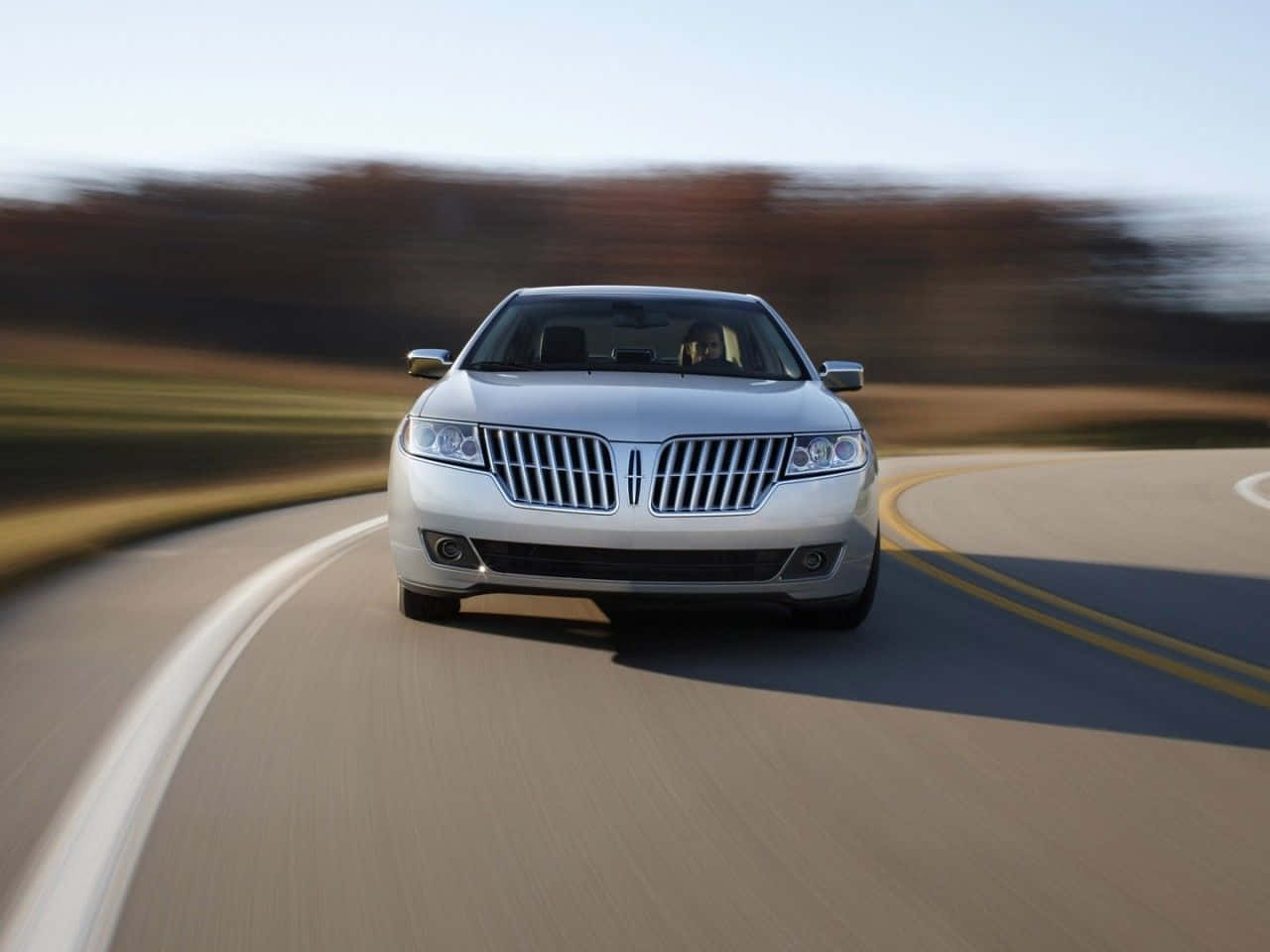 silver Lincoln, curving road, blurred autumn trees, HD Desktop Wallpaper