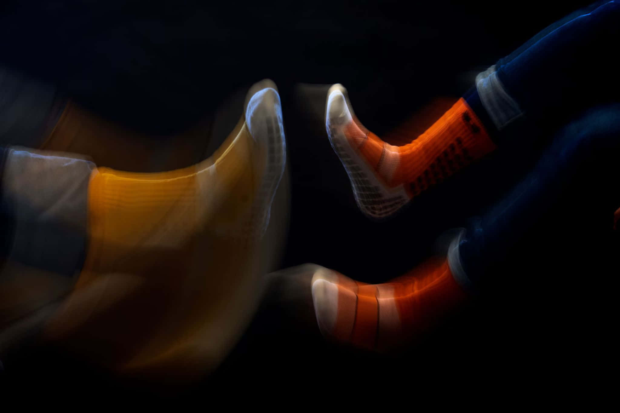 Motion Blurred Socksin Darkness, orange socks, yellow socks, Full HD Desktop Wallpaper
