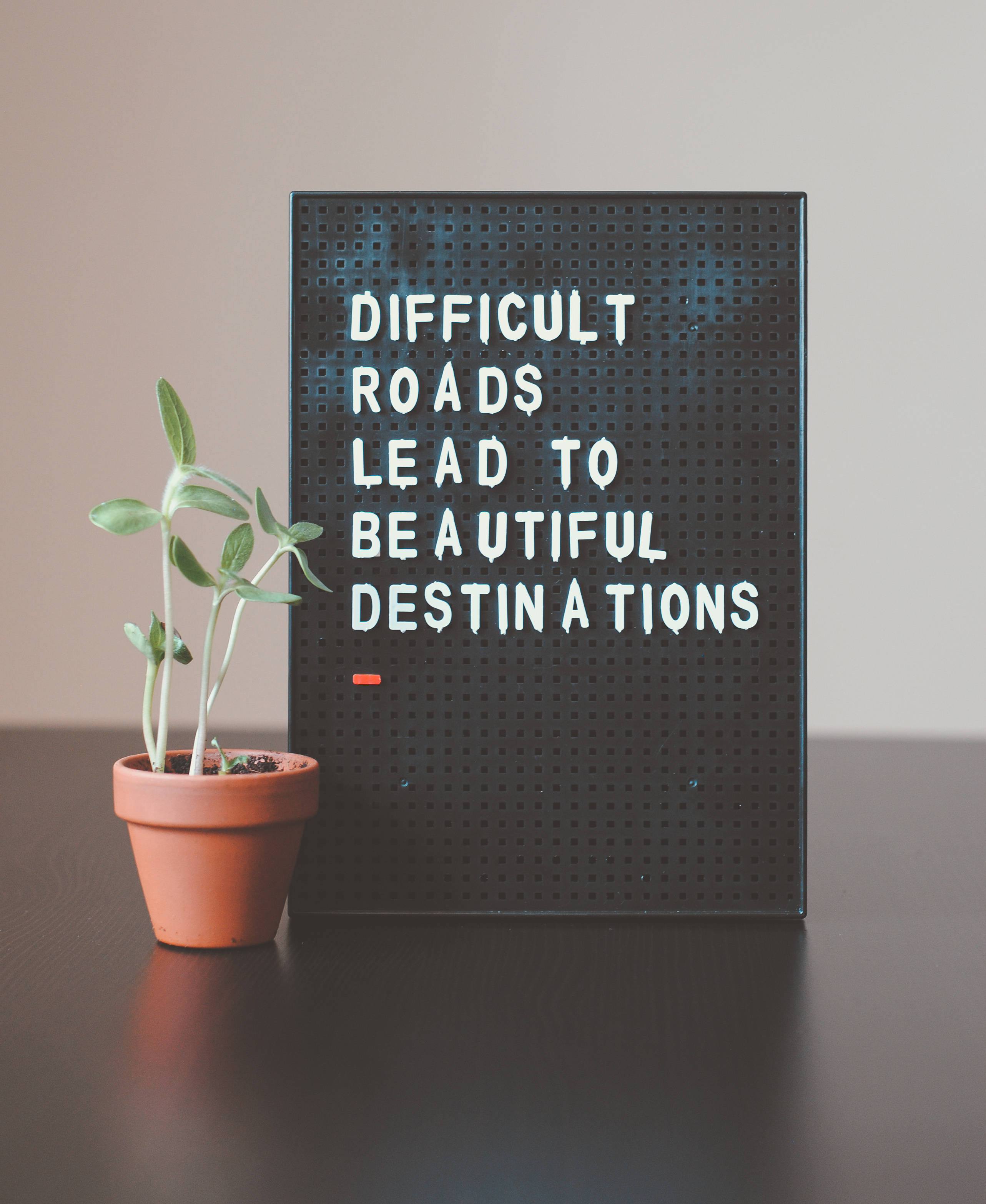 black letterboard, motivational phrase difficult roads lead to beautiful destinations, serene sunrise, 2K Phone Wallpaper