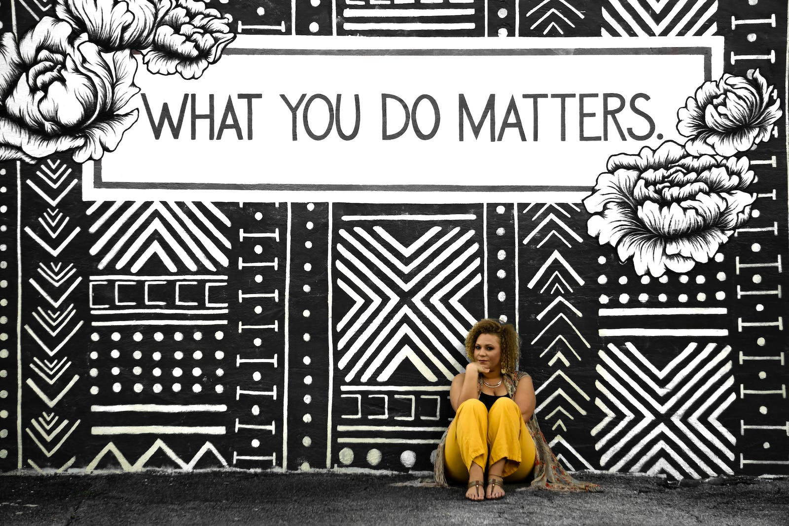 yellow pants, black and white geometric mural, floral accents, HD Desktop Wallpaper