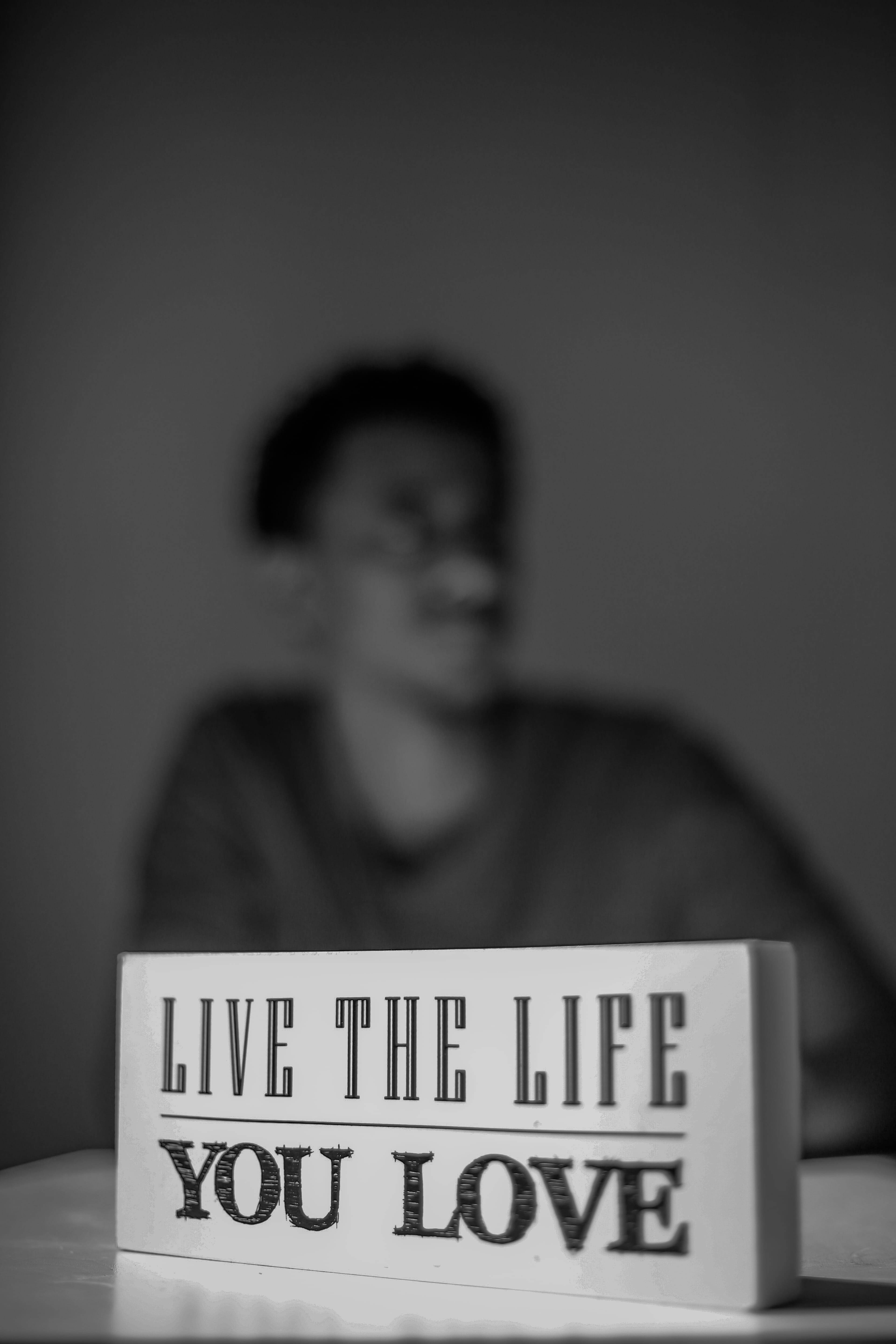 LIVE THE LIFE YOU LOVE, black and white sign, table, 5K Phone Wallpaper