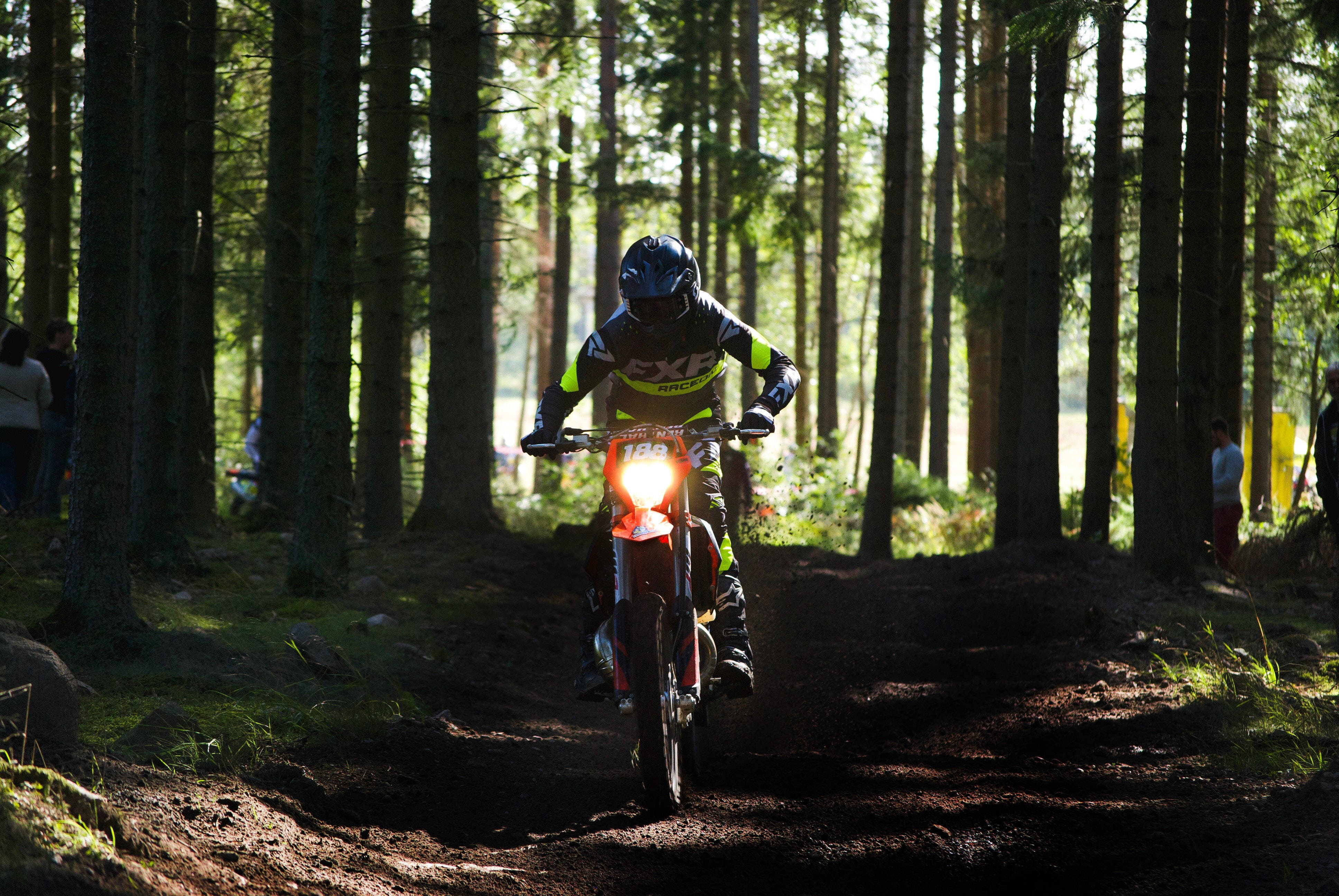 dirt bike, sunlit forest trail, motocross rider, 4K Desktop Wallpaper