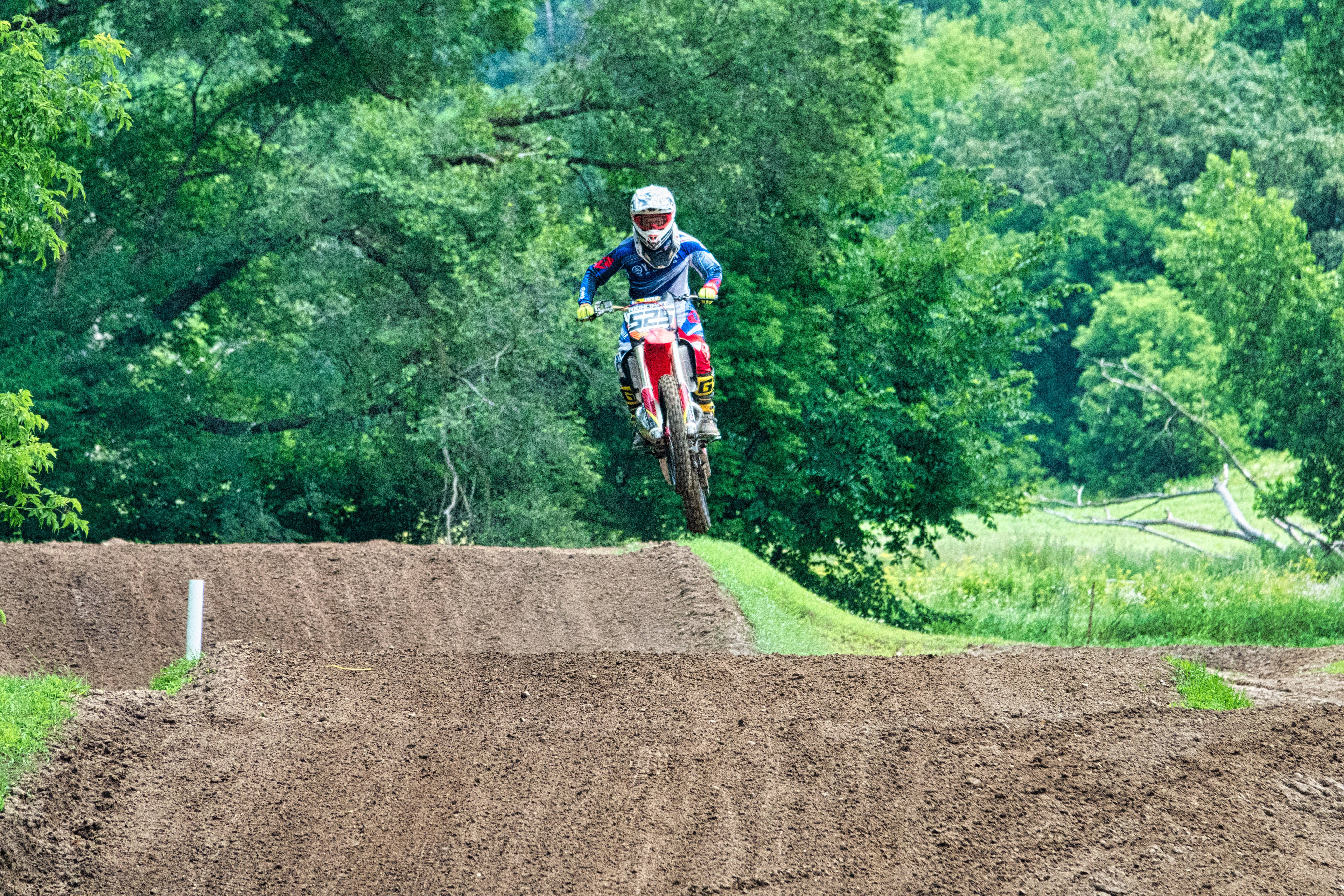 dirtbike, dirt jump, lush green forest, 5K Desktop Wallpaper