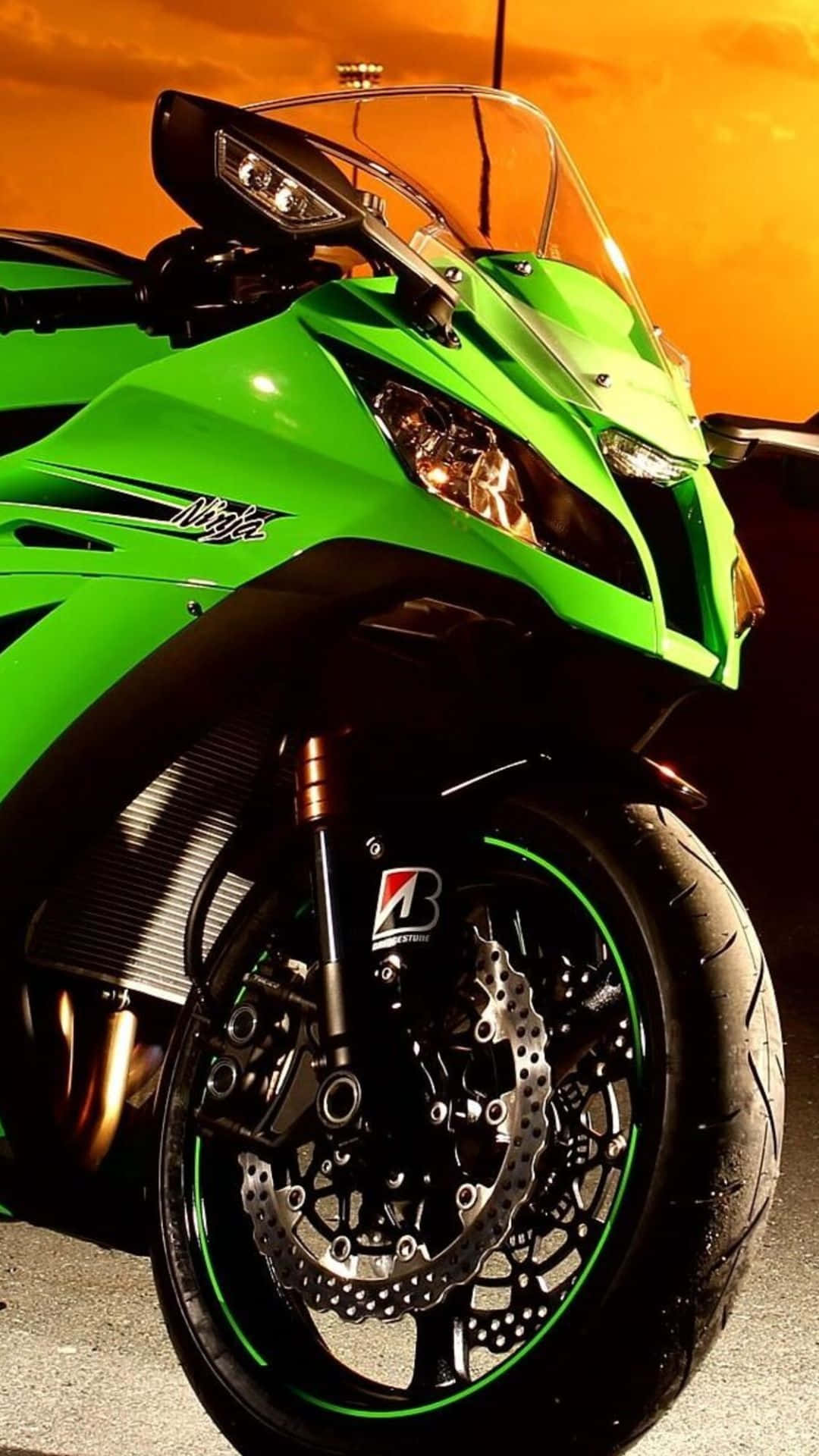 Lime Green Motorcycle, fiery orange sunset sky, front wheel, Full HD Phone Wallpaper