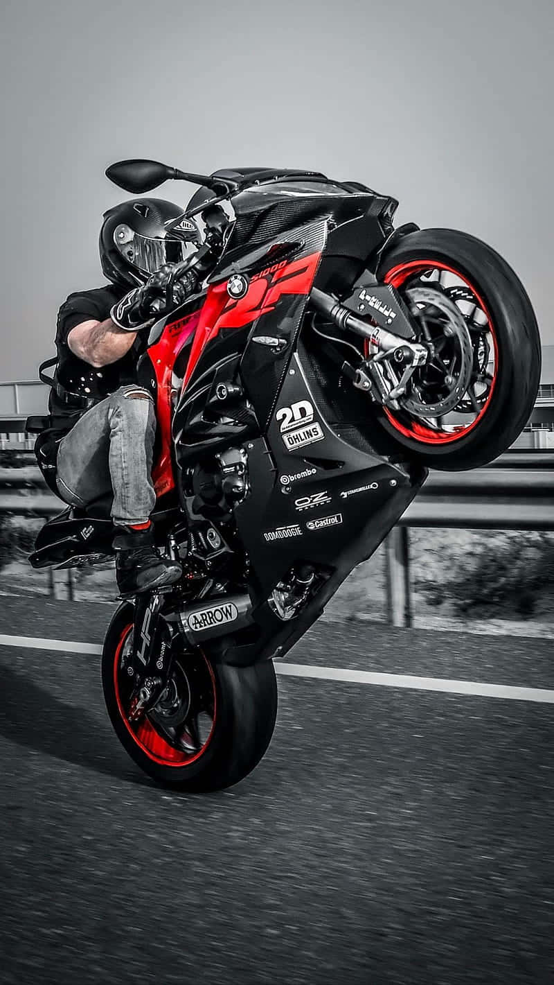 motorcycle man, wheelie, red and black sport motorcycle, HD Phone Wallpaper