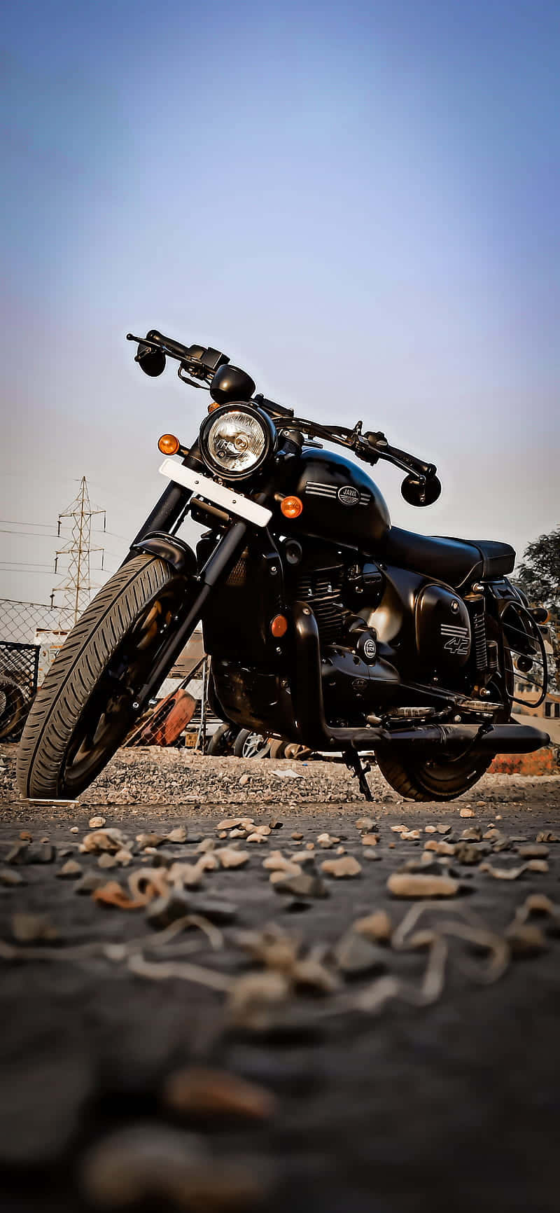 sleek black motorcycle, gravel lot, clear blue sky, HD Phone Wallpaper