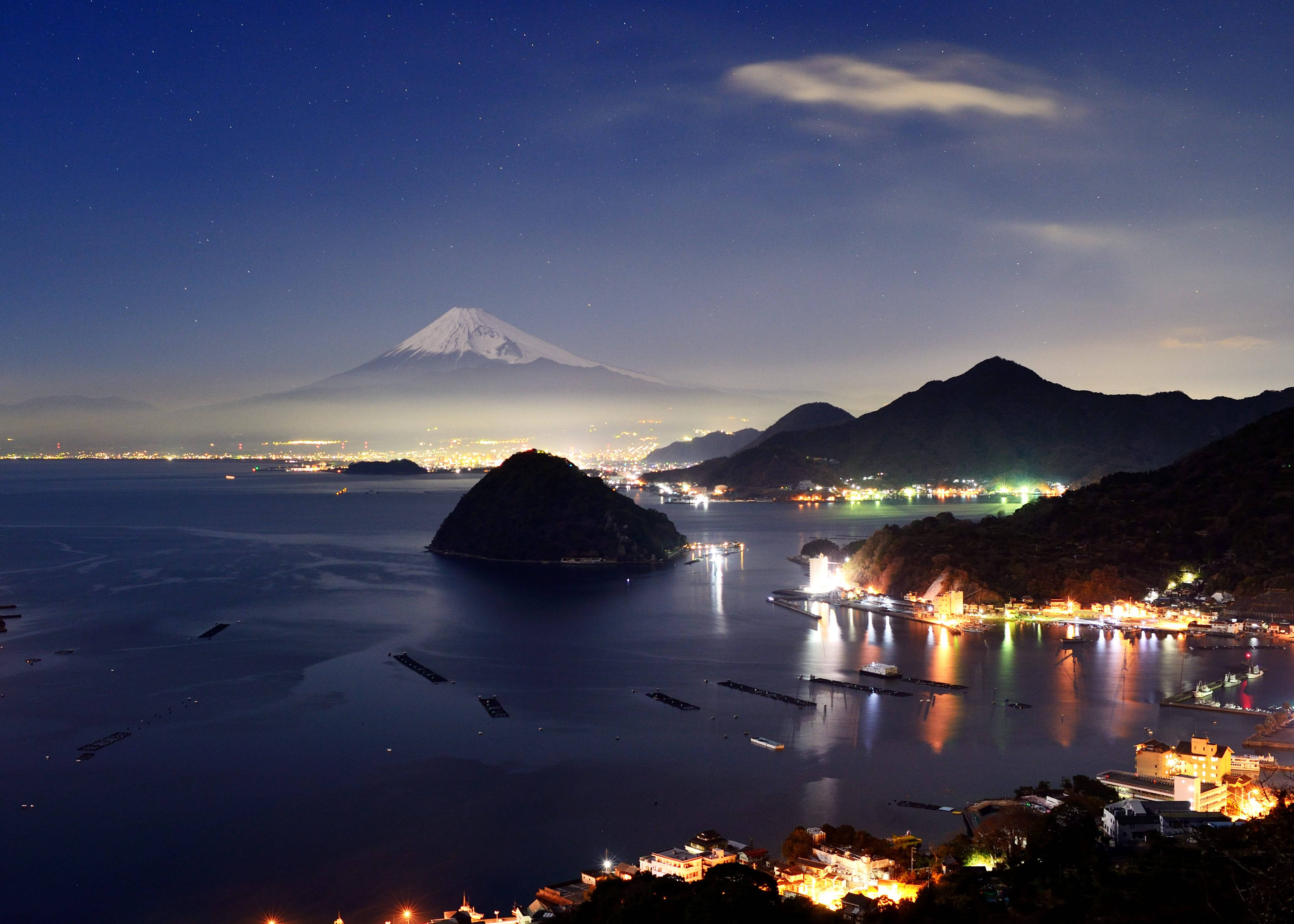 Mount Fuji, starry night sky, glowing coastal town, 4K Desktop Wallpaper