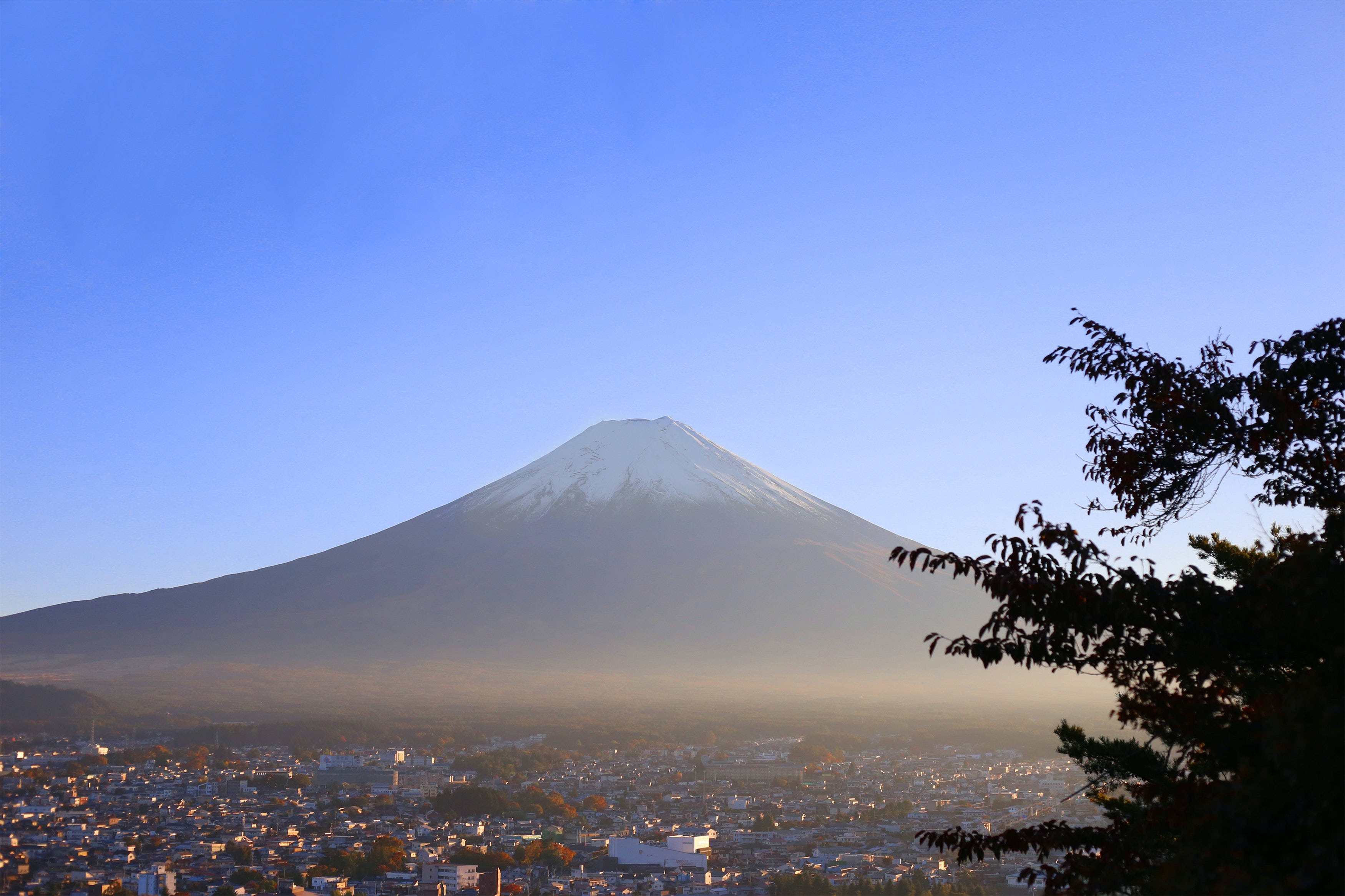 Mount Fuji, snow-capped, misty town, 2K Desktop Wallpaper