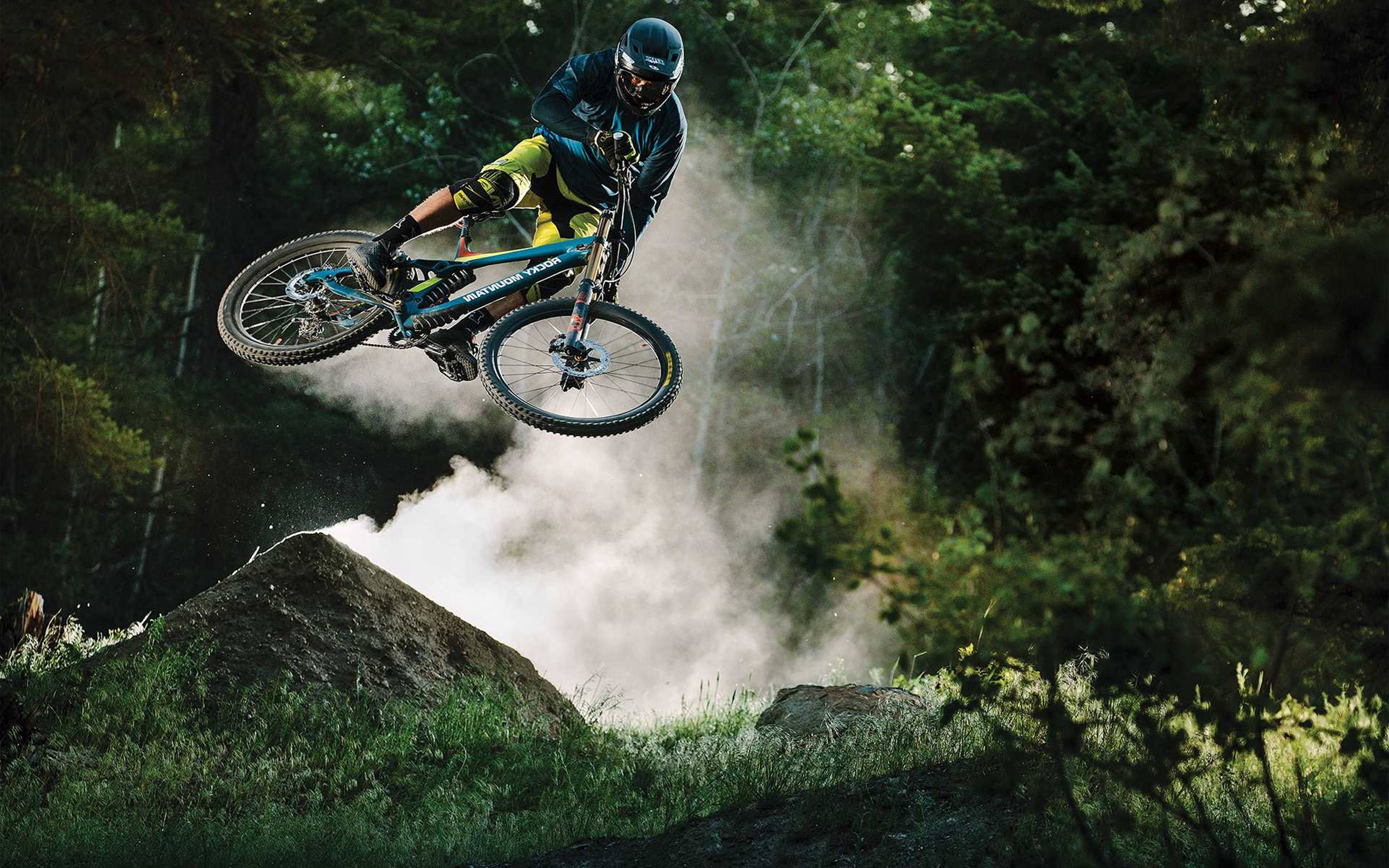 mountain biker, dirt jump, sunlit forest, 4K Desktop Wallpaper