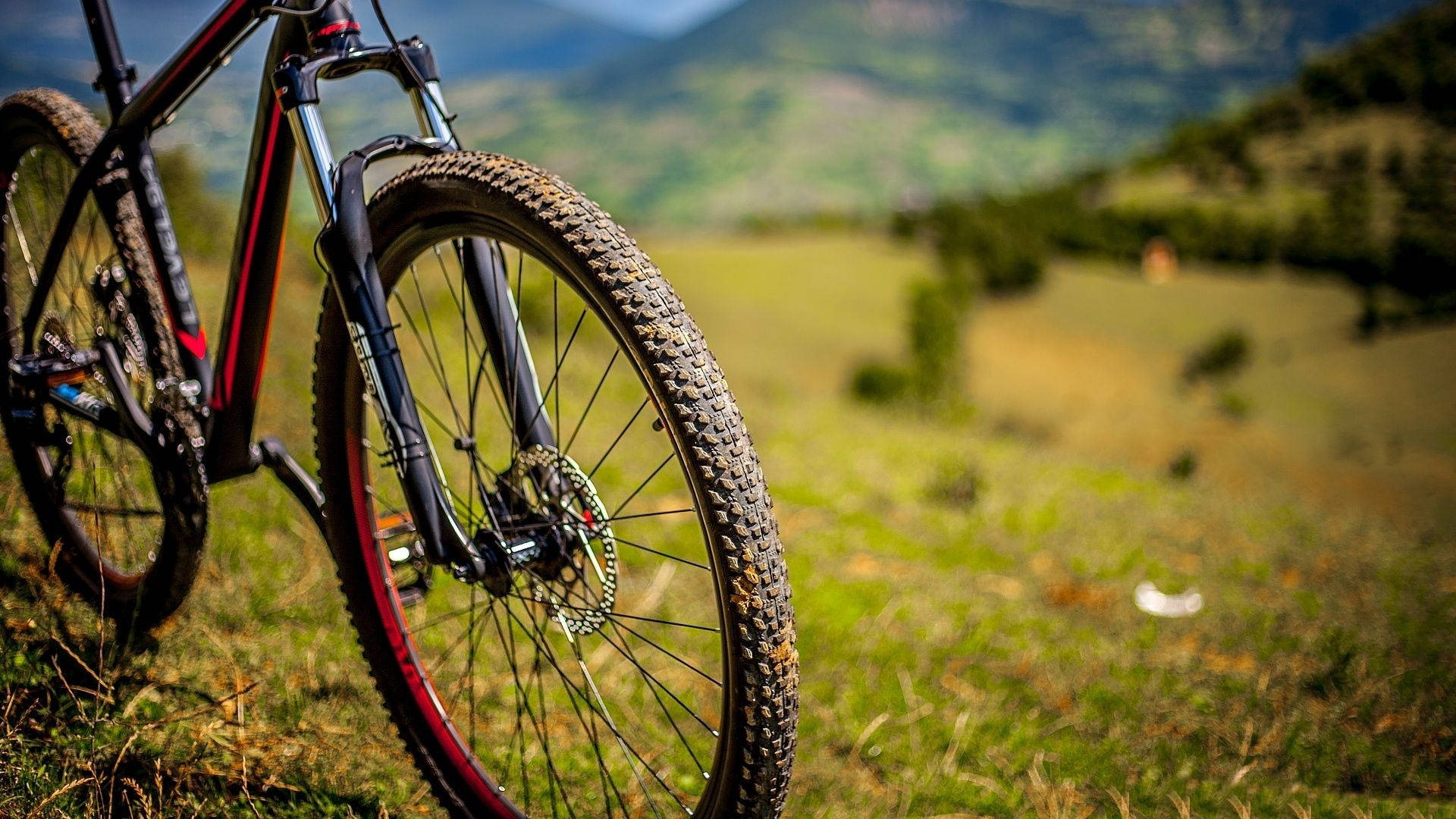 black mtb, muddy tires, grassy terrain, Full HD Desktop Wallpaper