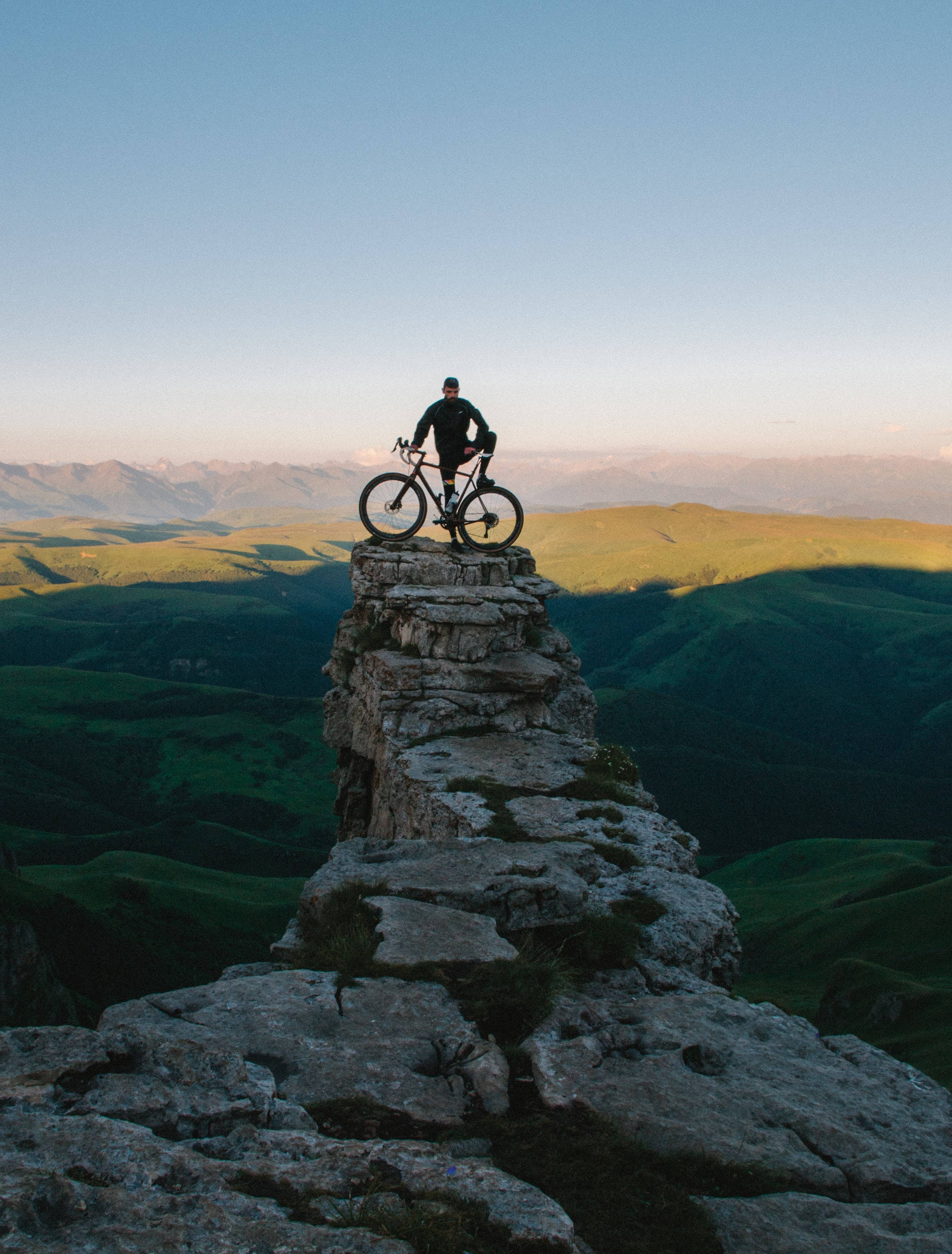 sport biker, cliff, sunset, 2K Phone Wallpaper