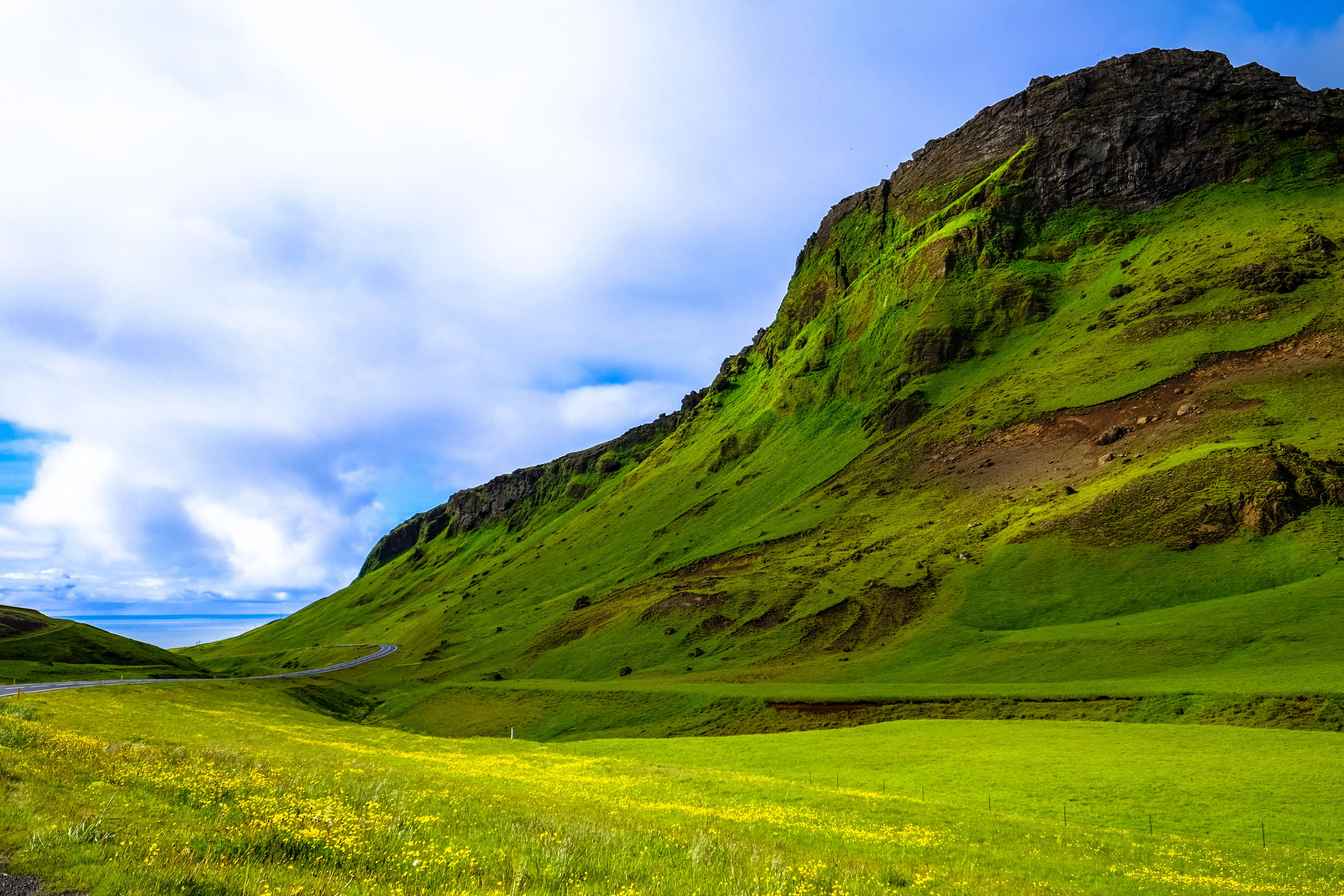 Mountain iPhone, winding road, vibrant green valley, 4K Desktop Wallpaper