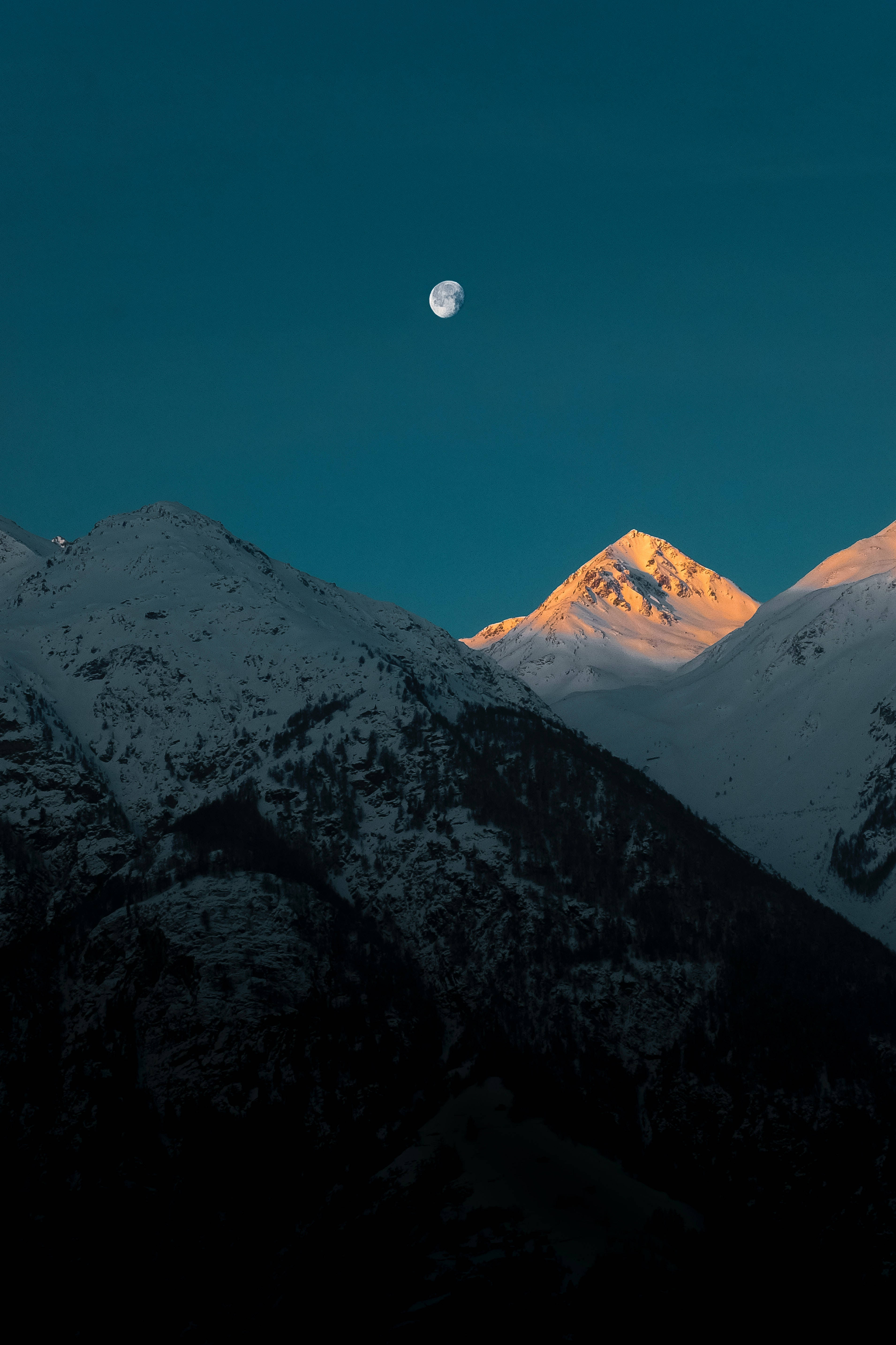 snowcapped mountain peak, moon, deep teal twilight sky, 5K Phone Wallpaper