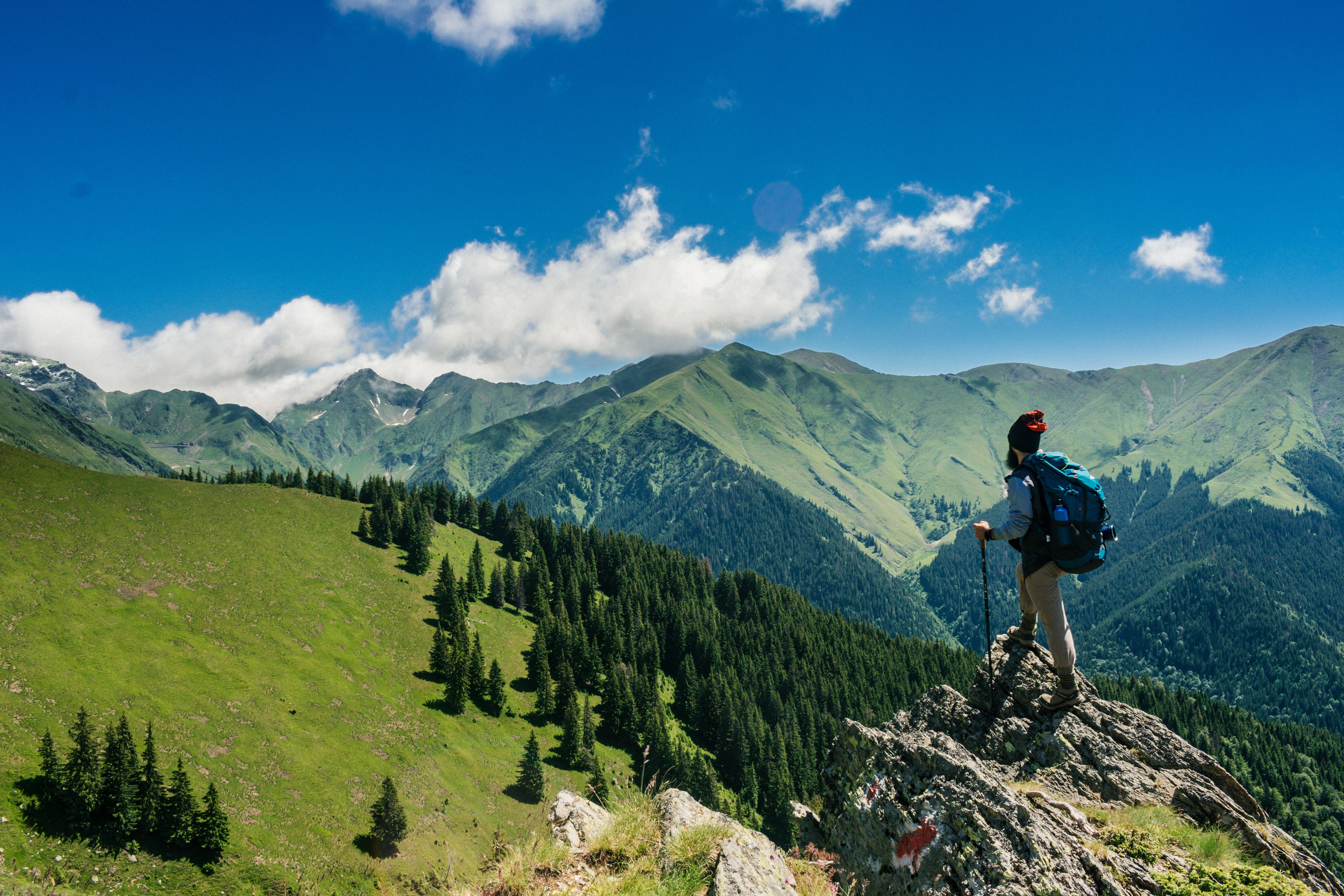 blue backpack, rocky peak, green valley, 5K Desktop Wallpaper