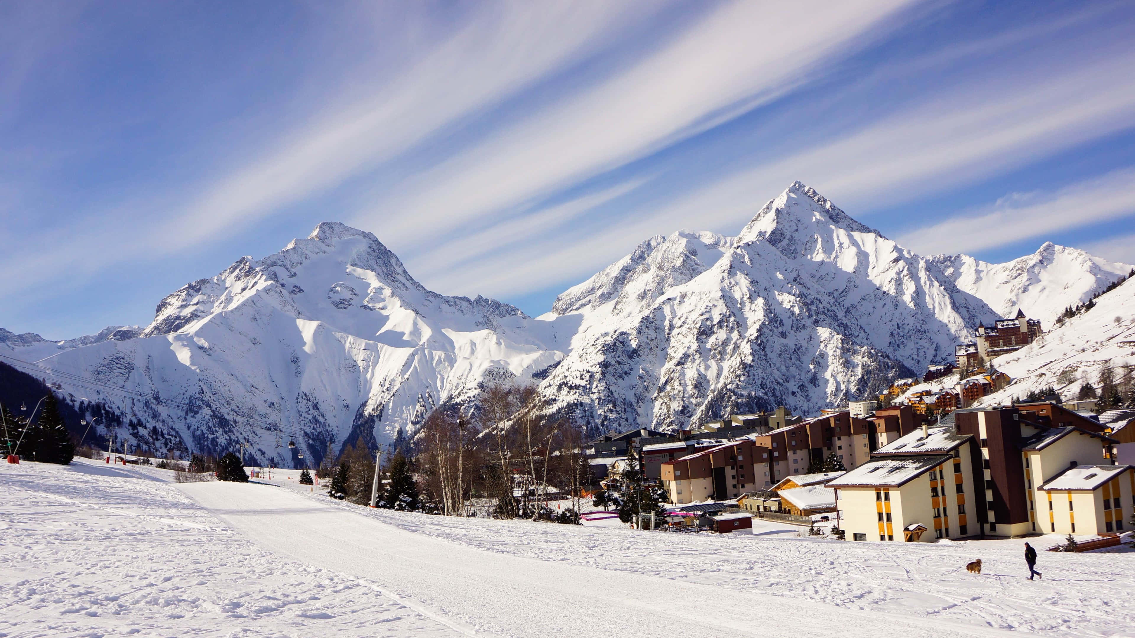 snowy mountain peaks, ski resort village, bright blue sky, 4K Desktop Wallpaper