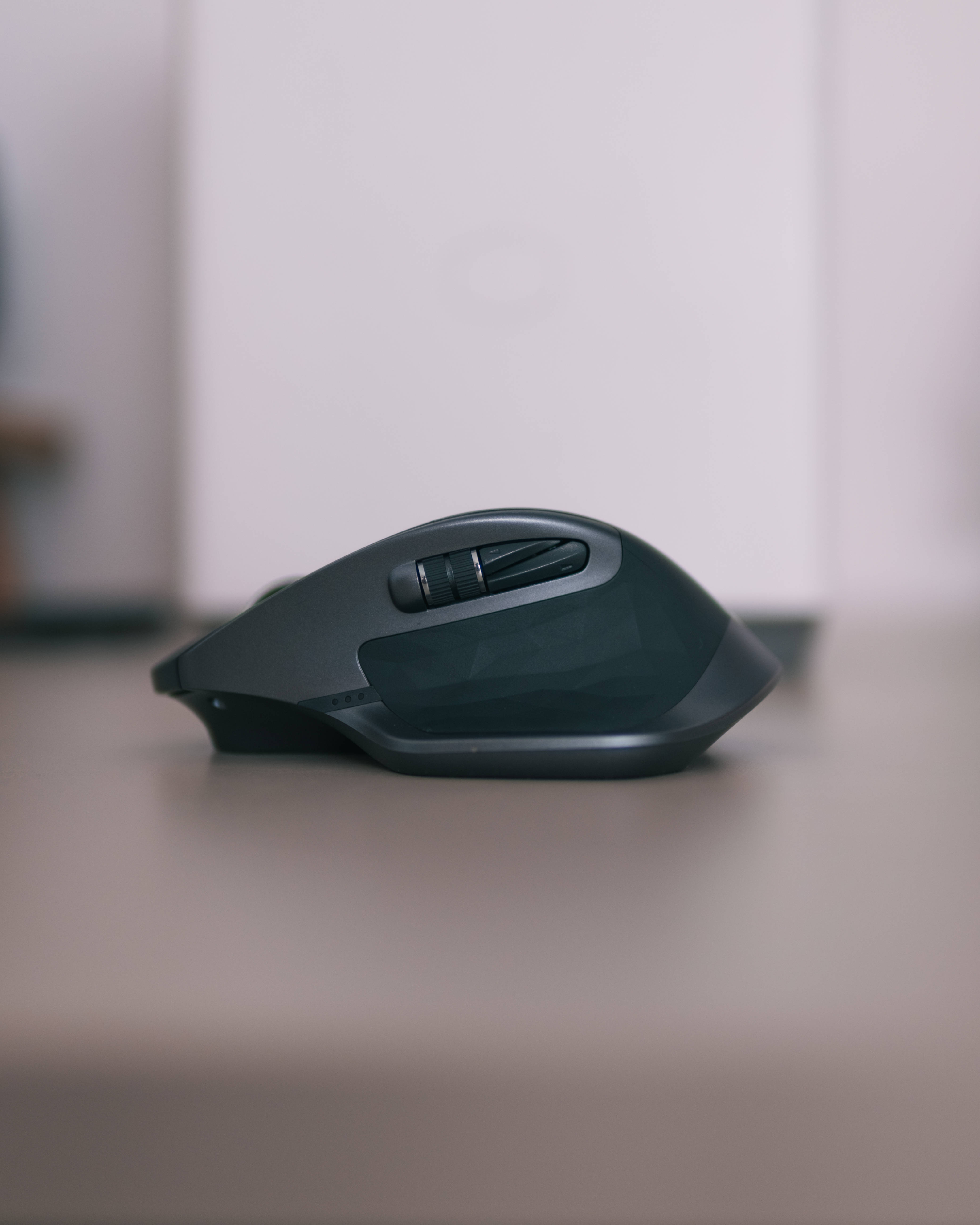 matte black body, ergonomic computer mouse, minimalist desk, 5K Phone Wallpaper